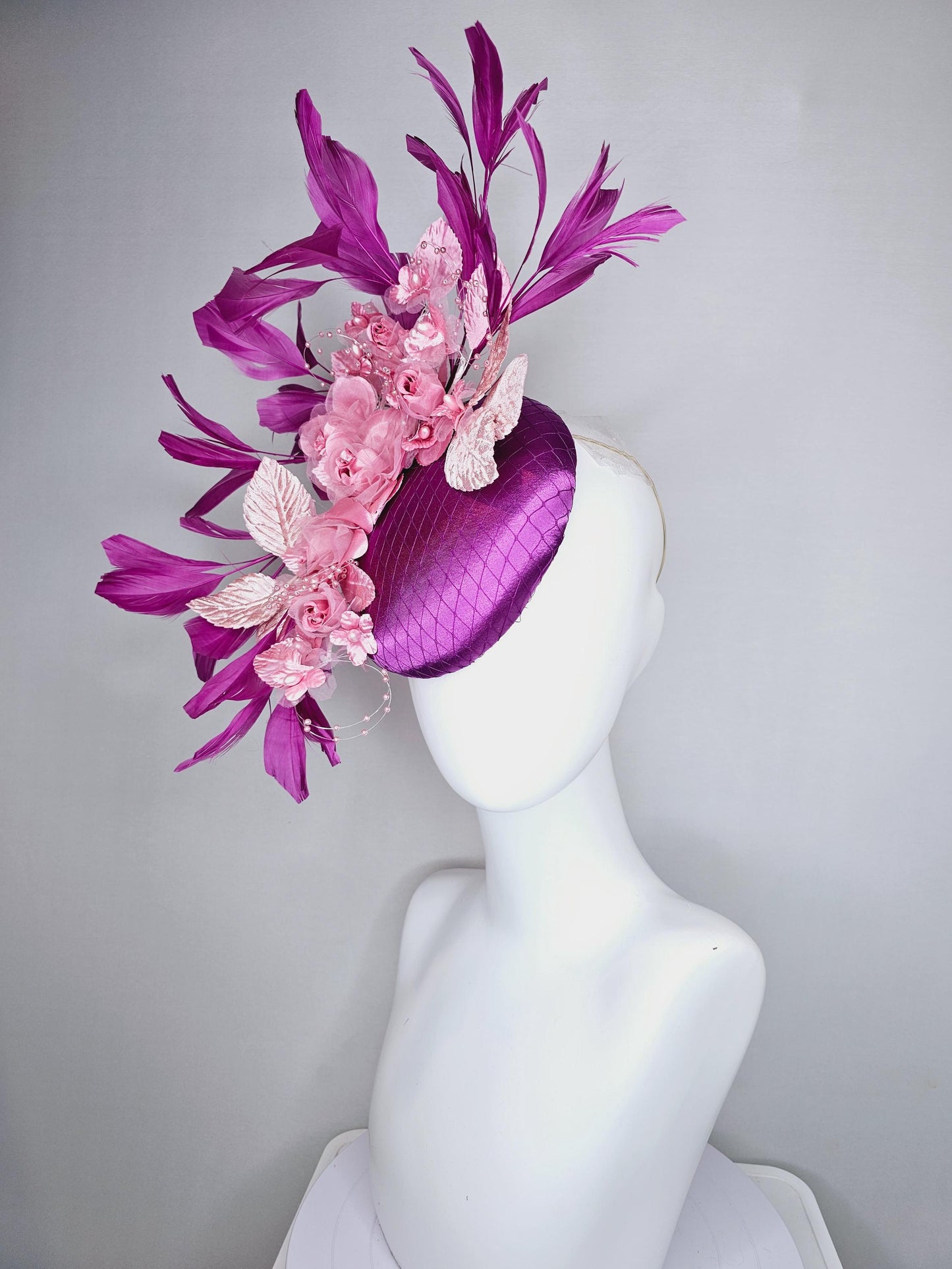 kentucky derby hat fascinator purple satin with netting, light blush pink organza satin flowers, light pink leaves, magenta purple feathers