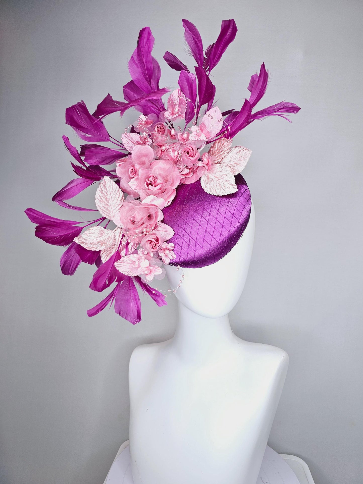 kentucky derby hat fascinator purple satin with netting, light blush pink organza satin flowers, light pink leaves, magenta purple feathers