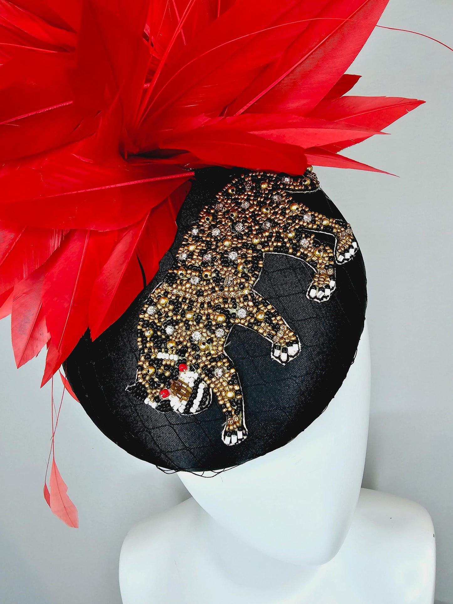 kentucky derby hat fascinator black satin with netting and black gold crystal rhinestone beaded tiger, red cherry branching feathers