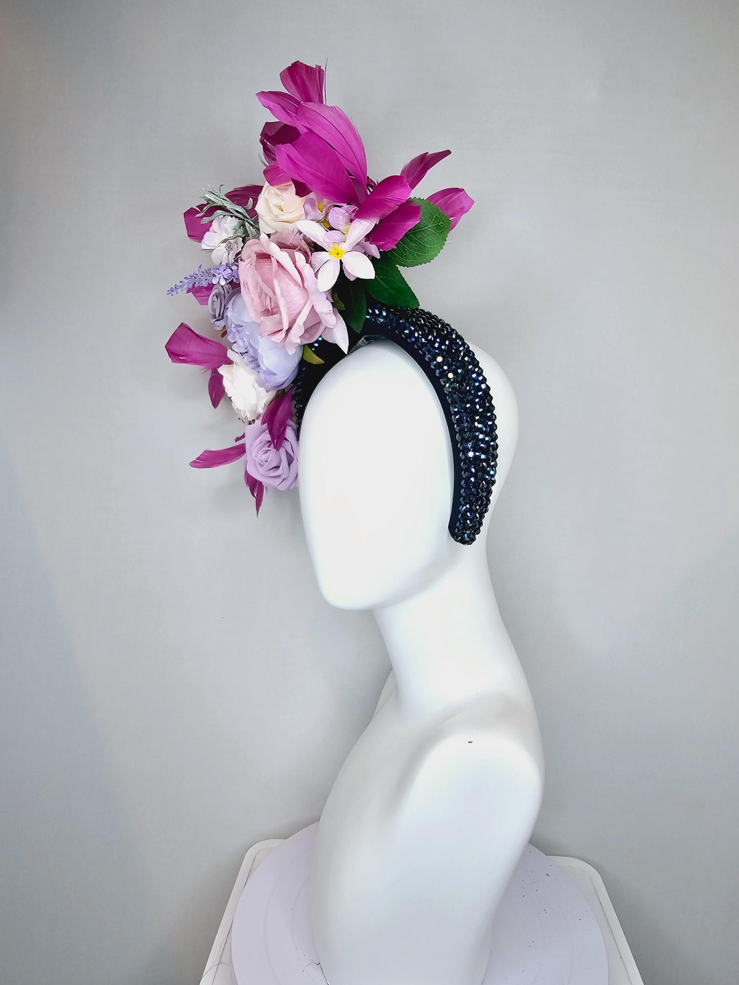 kentucky derby hat fascinator iridescent navy blue crystal headband,cream light pink purple lavender flowers,green leaves,magenta feathers