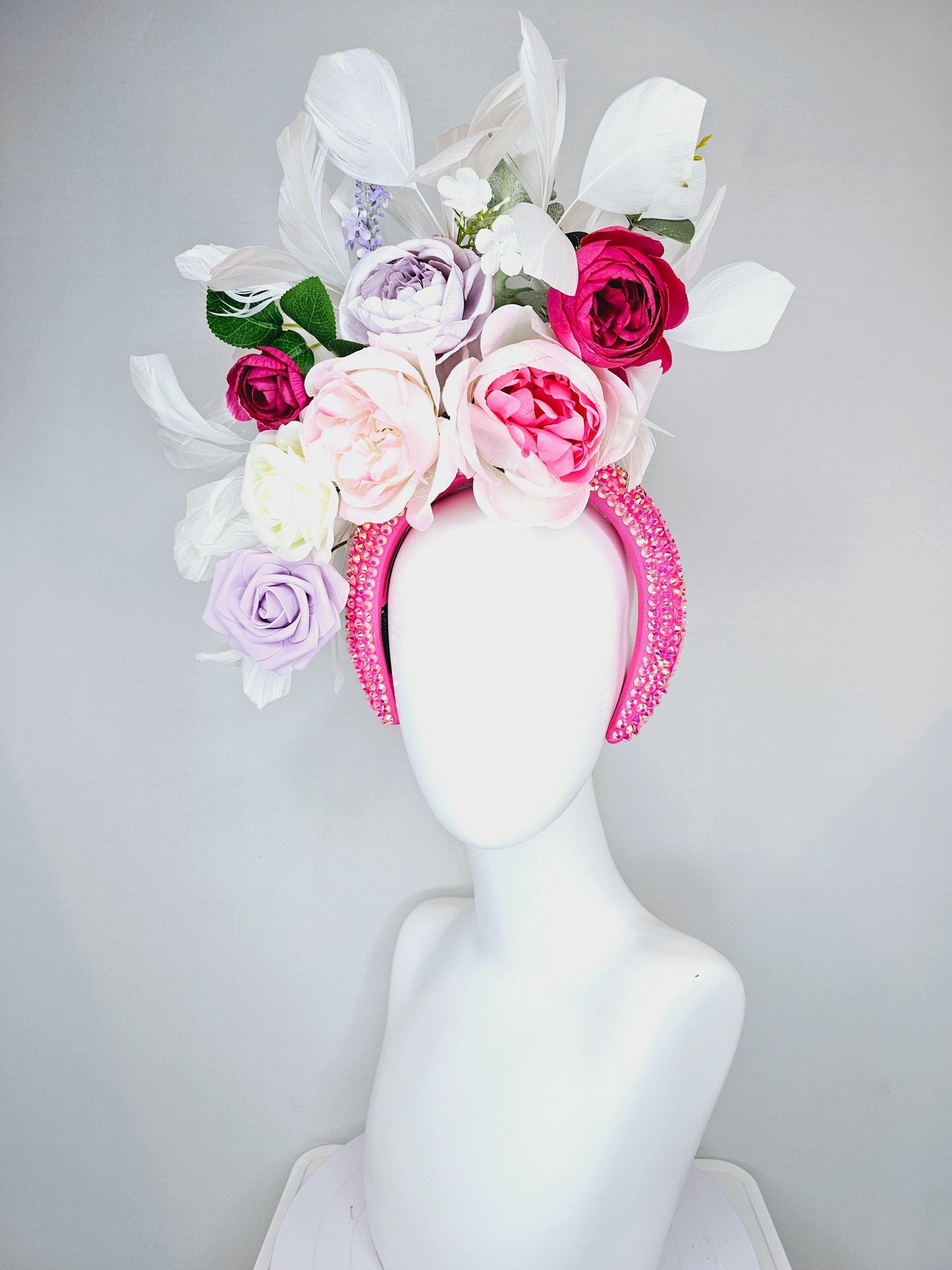 kentucky derby hat fascinator iridescent pink crystal headband,cream blush pink light purple pink rose flowers,green leaves,white feathers