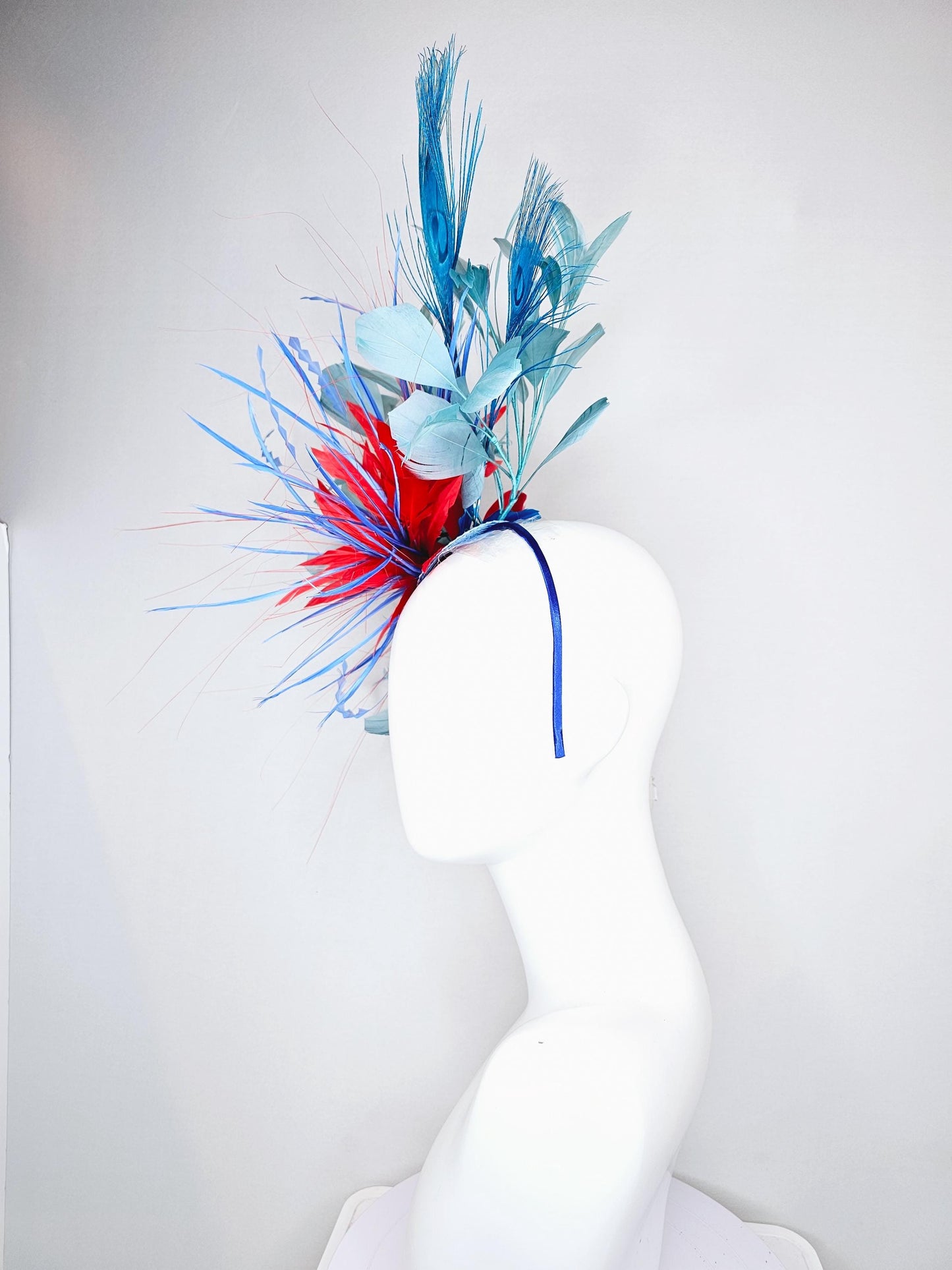 kentucky derby hat fascinator red royal blue feather flower,baby royal blue zigzag feathers, light teal blue and blue peacock feathers