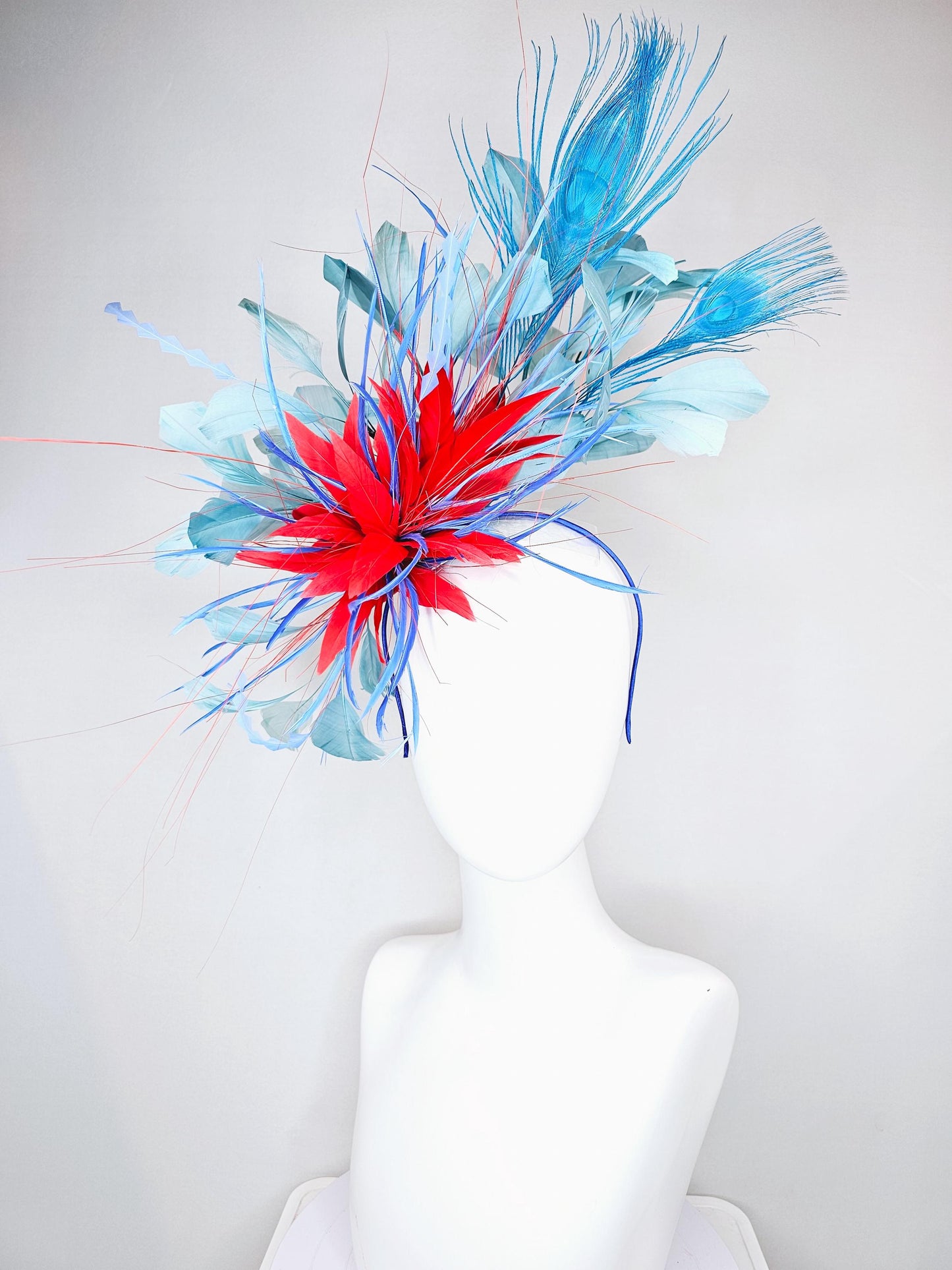 kentucky derby hat fascinator red royal blue feather flower,baby royal blue zigzag feathers, light teal blue and blue peacock feathers