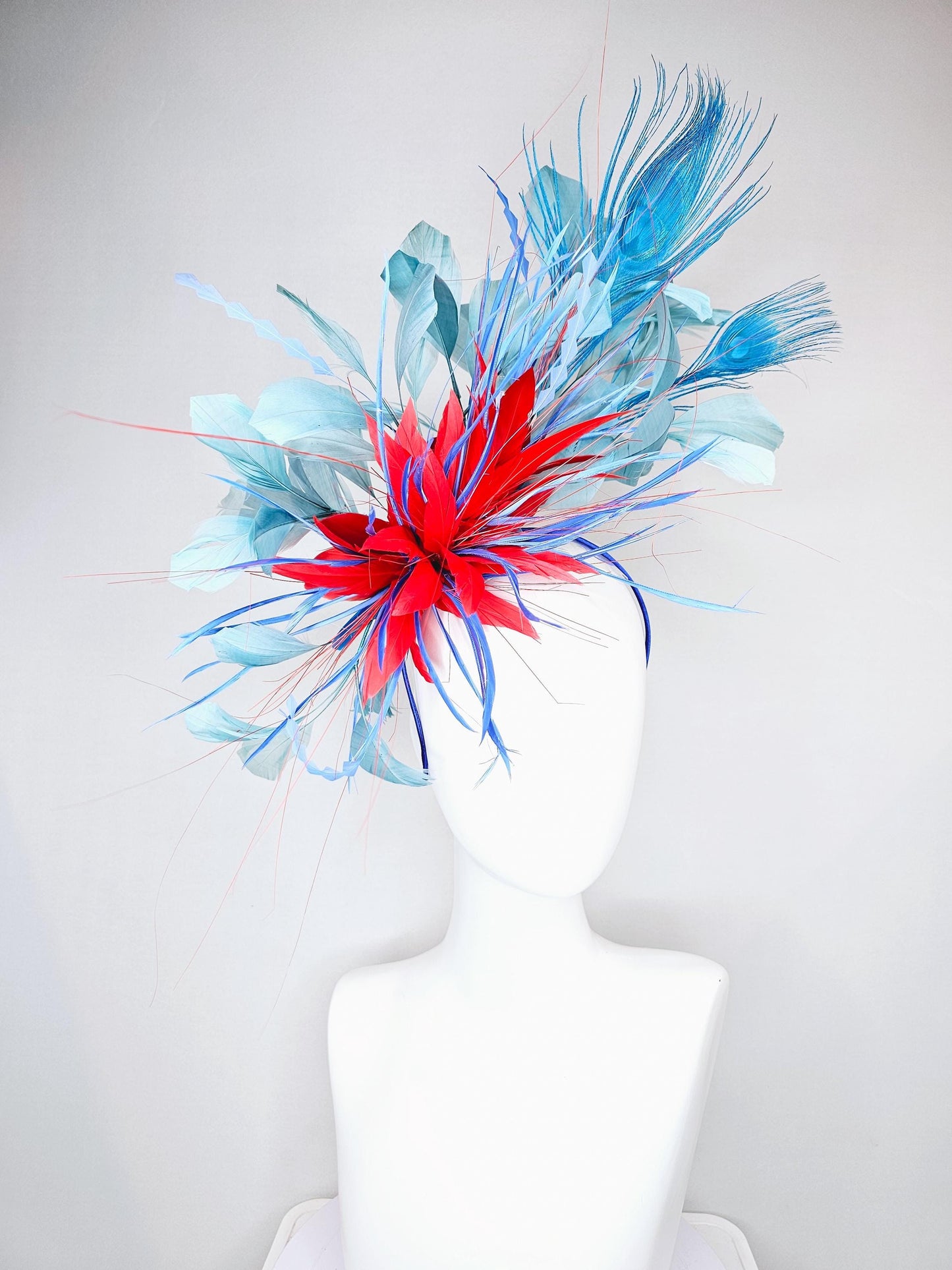 kentucky derby hat fascinator red royal blue feather flower,baby royal blue zigzag feathers, light teal blue and blue peacock feathers