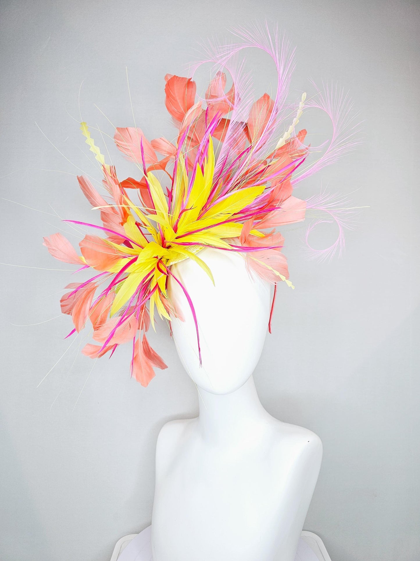 kentucky derby hat fascinator yellow and pink feather flower, yellow zigzag feathers, orange coral peach blush pink feathers