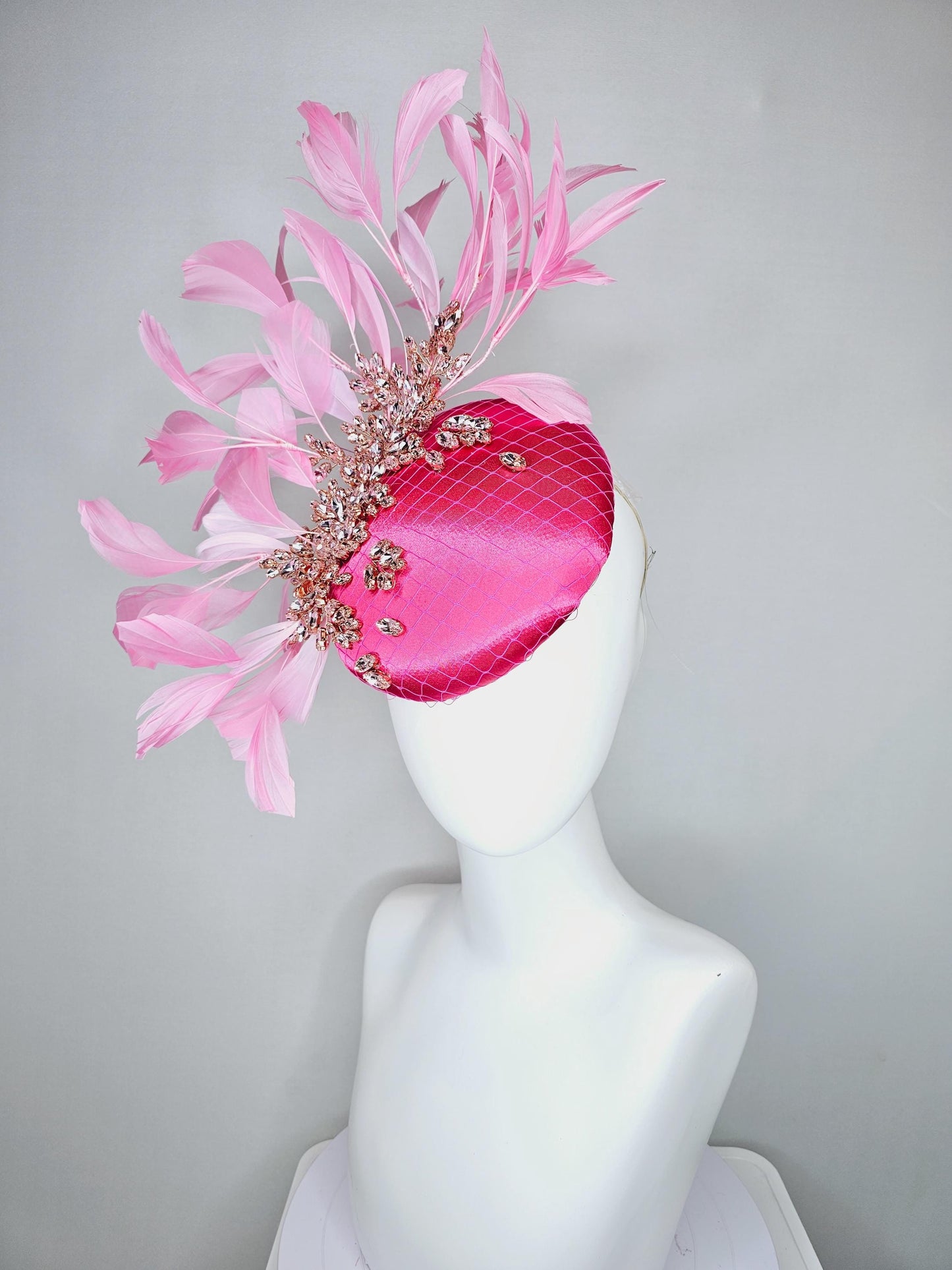 kentucky derby hat fascinator hot pink satin with netting and light pink crystal beaded jewels stems, light blush pink branching feathers