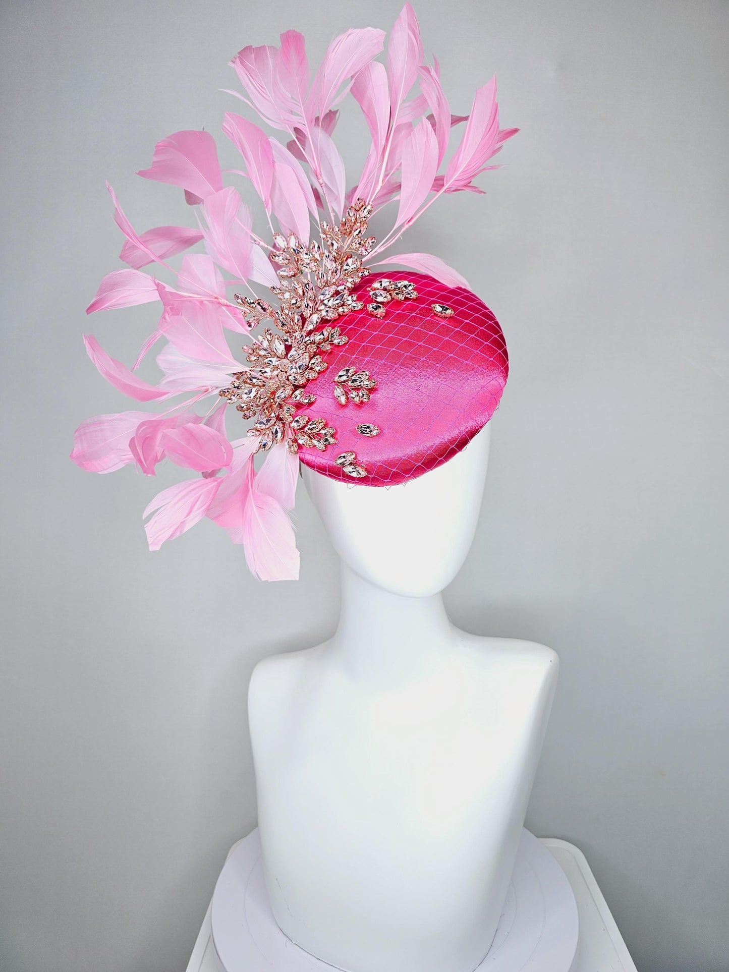 kentucky derby hat fascinator hot pink satin with netting and light pink crystal beaded jewels stems, light blush pink branching feathers