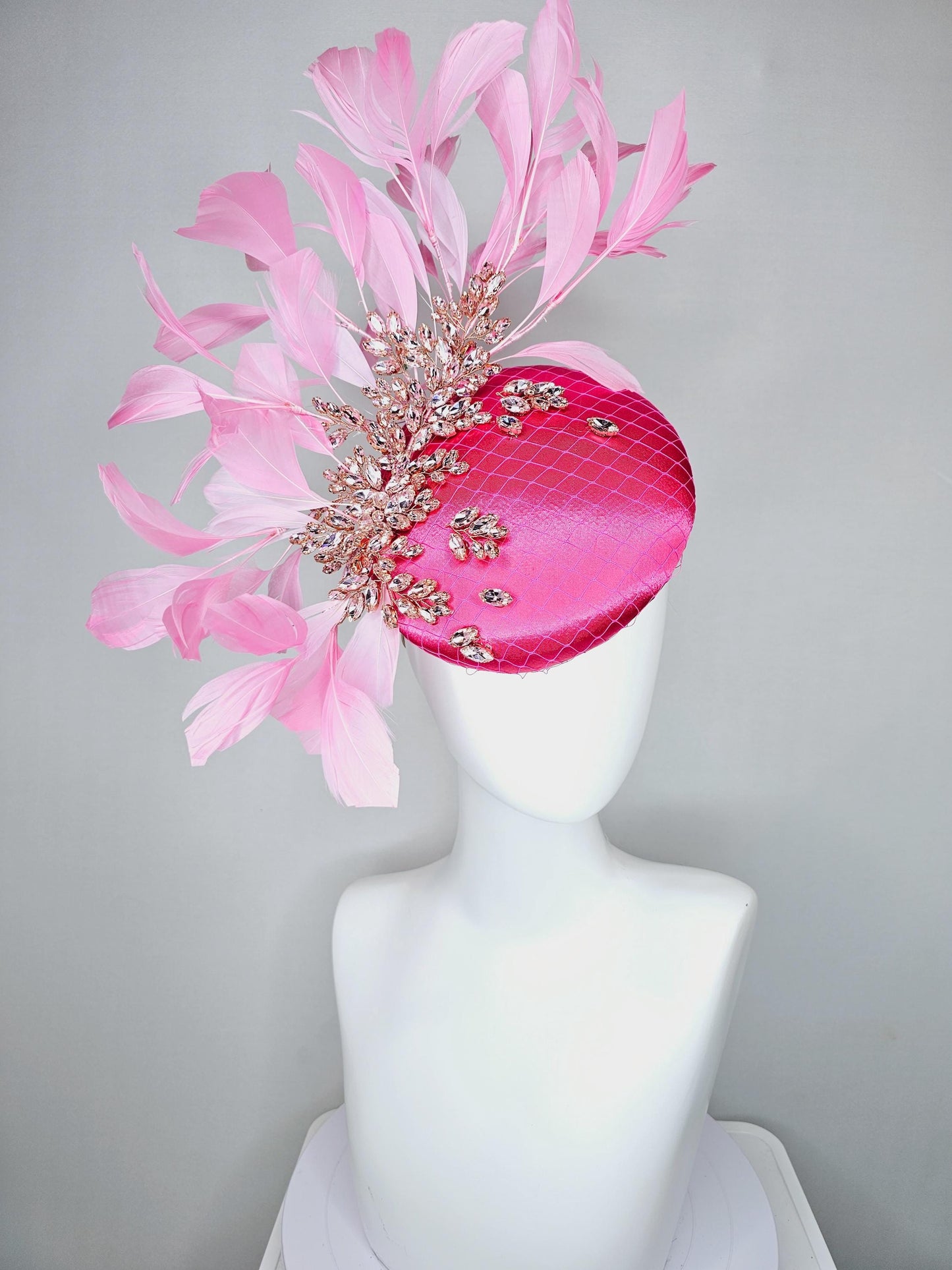 kentucky derby hat fascinator hot pink satin with netting and light pink crystal beaded jewels stems, light blush pink branching feathers