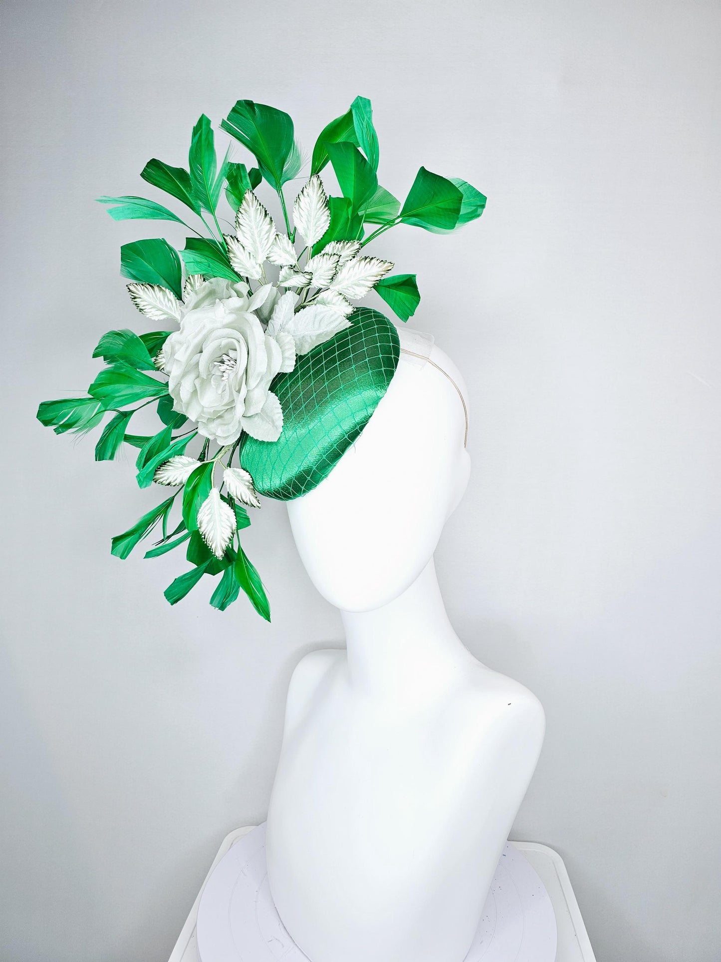 kentucky derby hat fascinator with emerald green satin with netting and mint light green satin silk rose flowers, green branching feathers