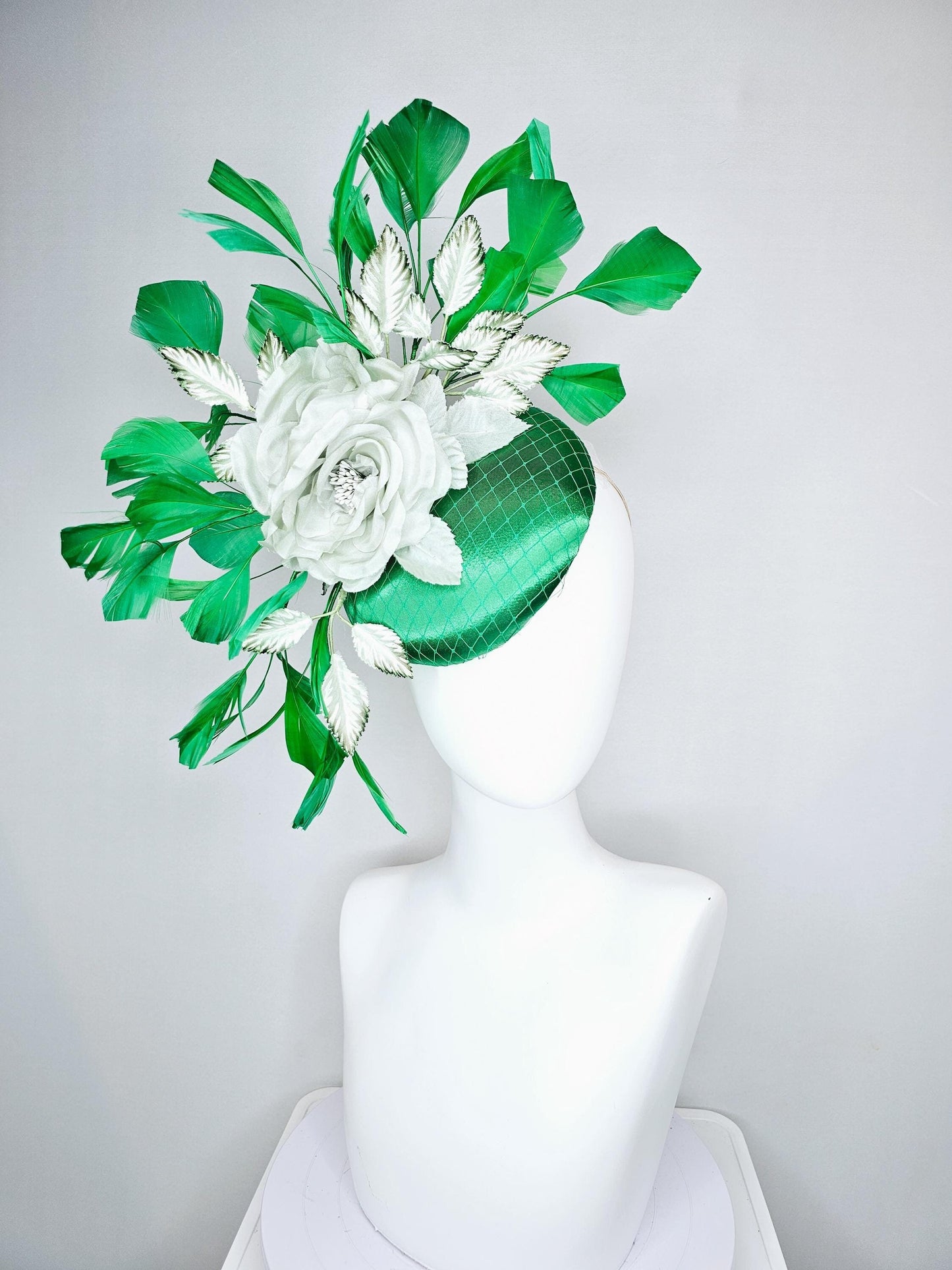 kentucky derby hat fascinator with emerald green satin with netting and mint light green satin silk rose flowers, green branching feathers