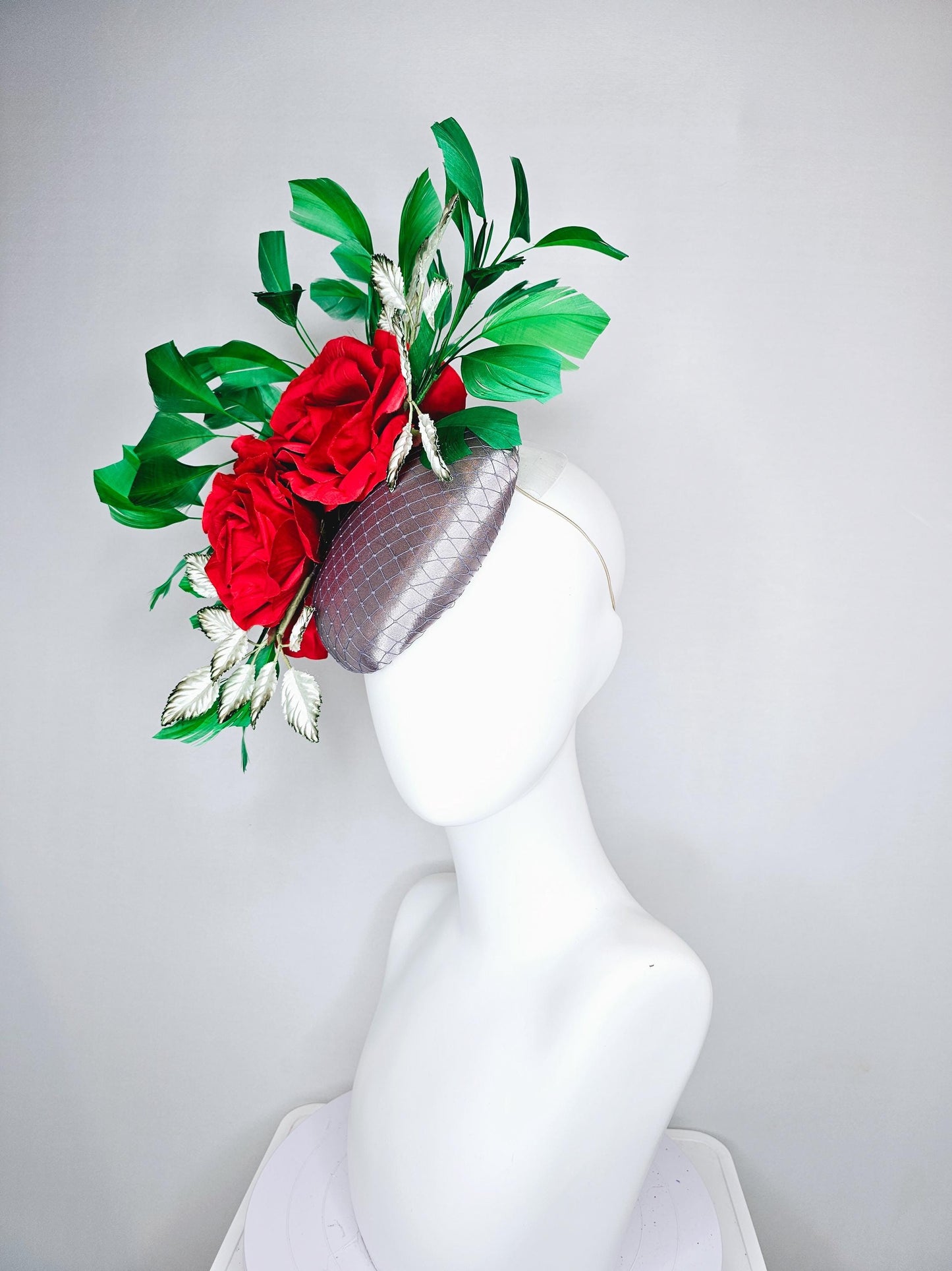 kentucky derby hat fascinator silver gray satin with netting,red silk roses flowers,ombre green leaves and bright green branching feathers