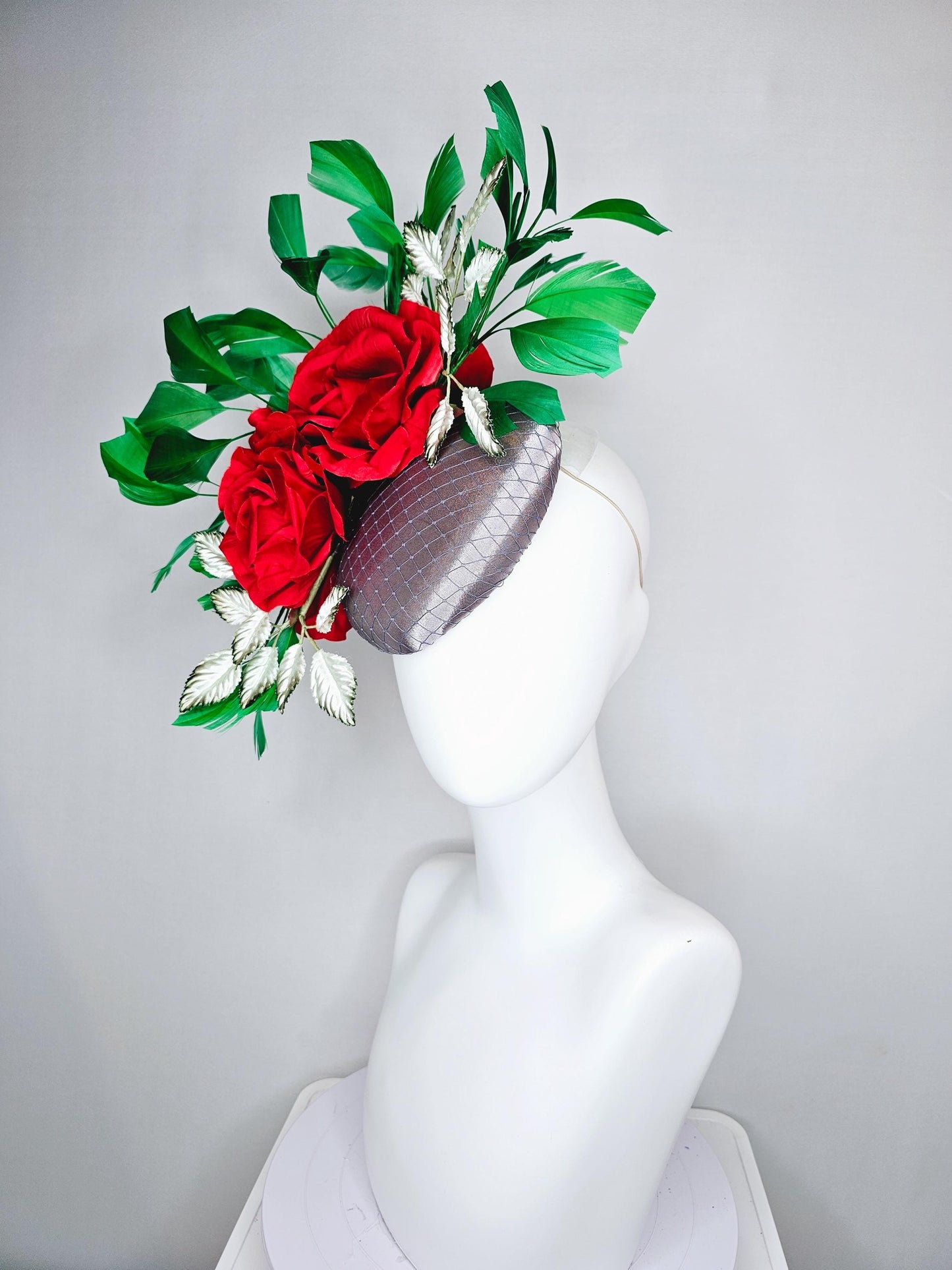 kentucky derby hat fascinator silver gray satin with netting,red silk roses flowers,ombre green leaves and bright green branching feathers