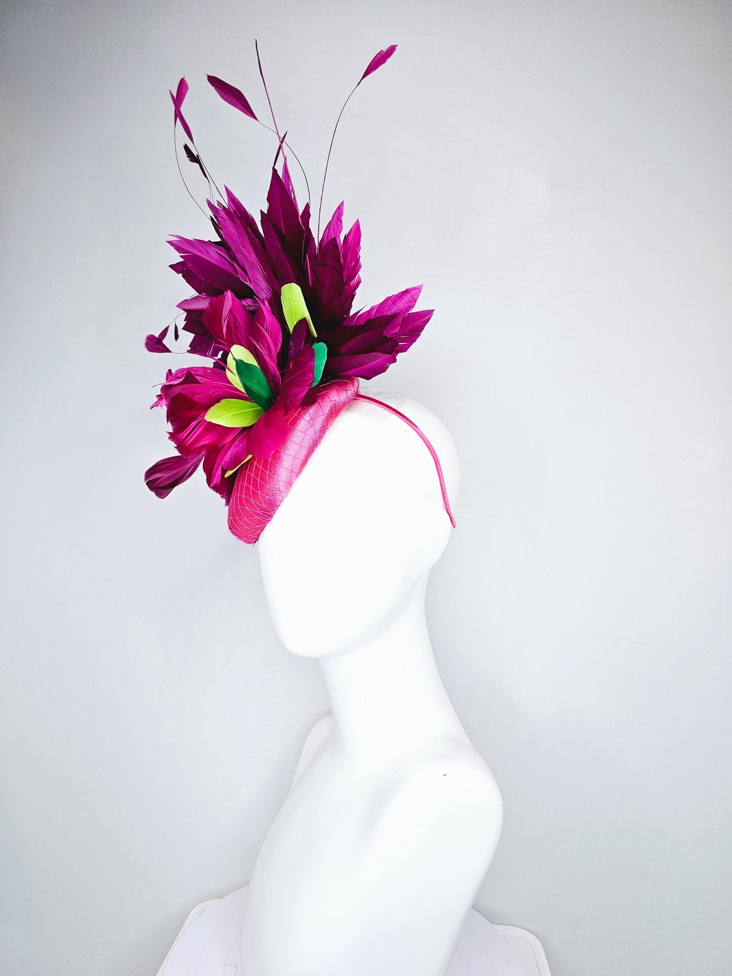 kentucky derby hat fascinator hot pink satin with netting,magenta purple branching feathers and lime green,blue green aqua,pink feathers