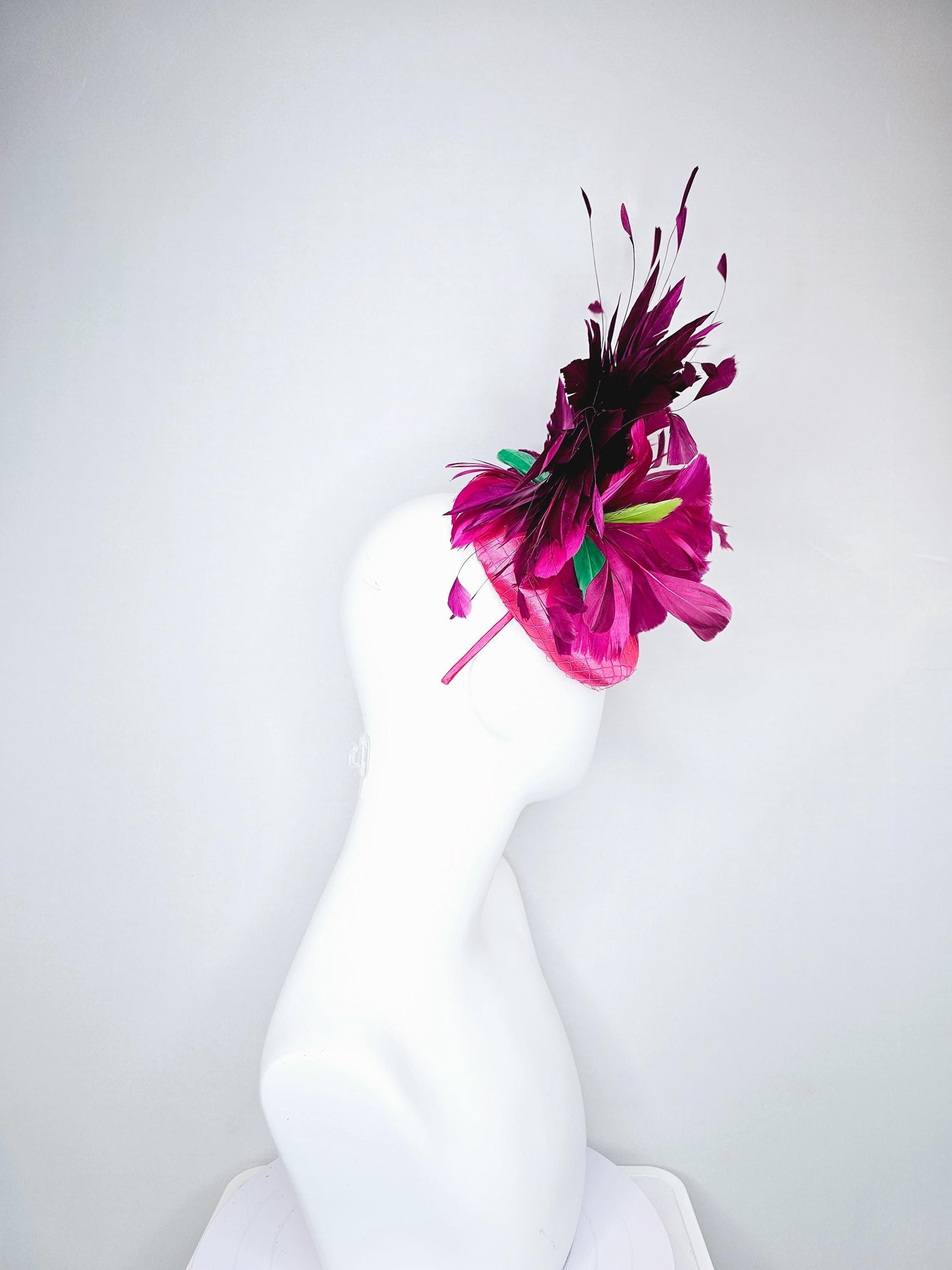 kentucky derby hat fascinator hot pink satin with netting,magenta purple branching feathers and lime green,blue green aqua,pink feathers