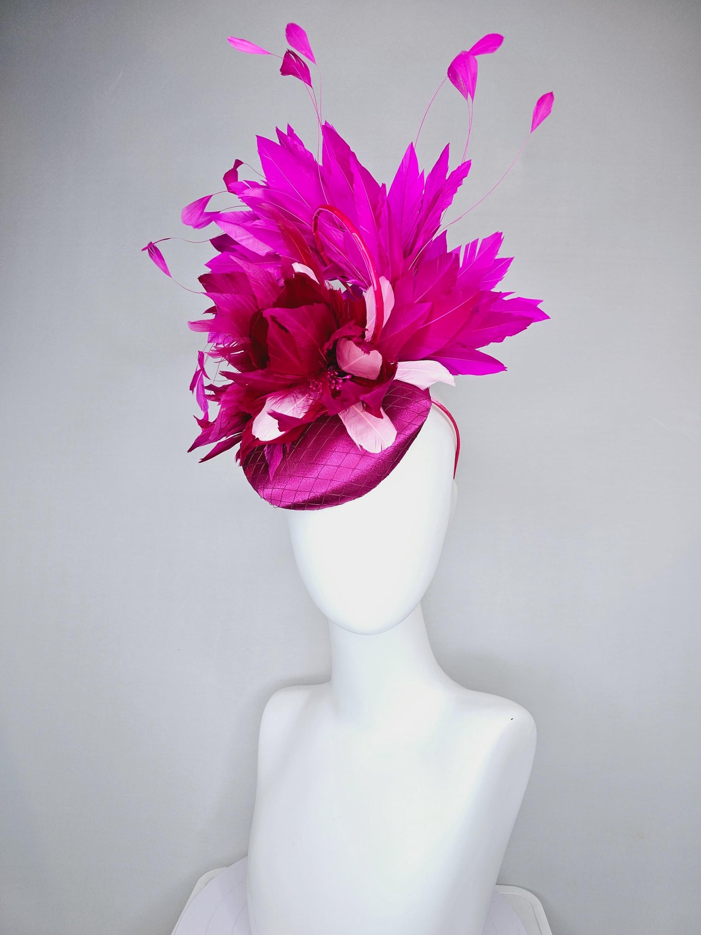 kentucky derby hat fascinator fuchsia hot pink satin with netting, dark and light pink feather flower with fuchsia pink branching feathers