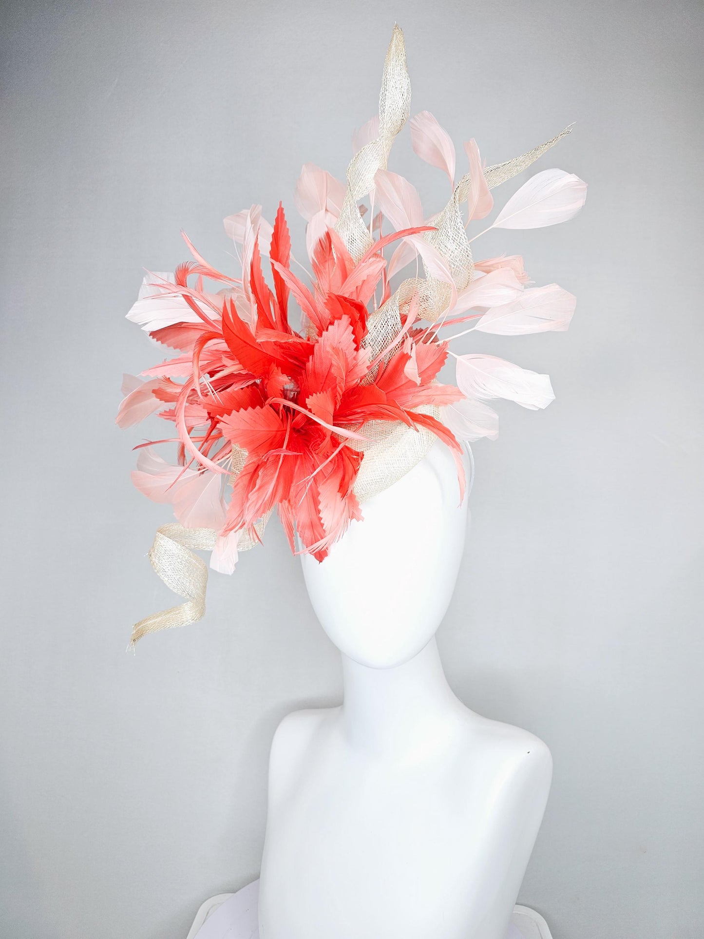 kentucky derby hat fascinator ivory white sinamay with curls,and coral feather flower with light pink branching feathers