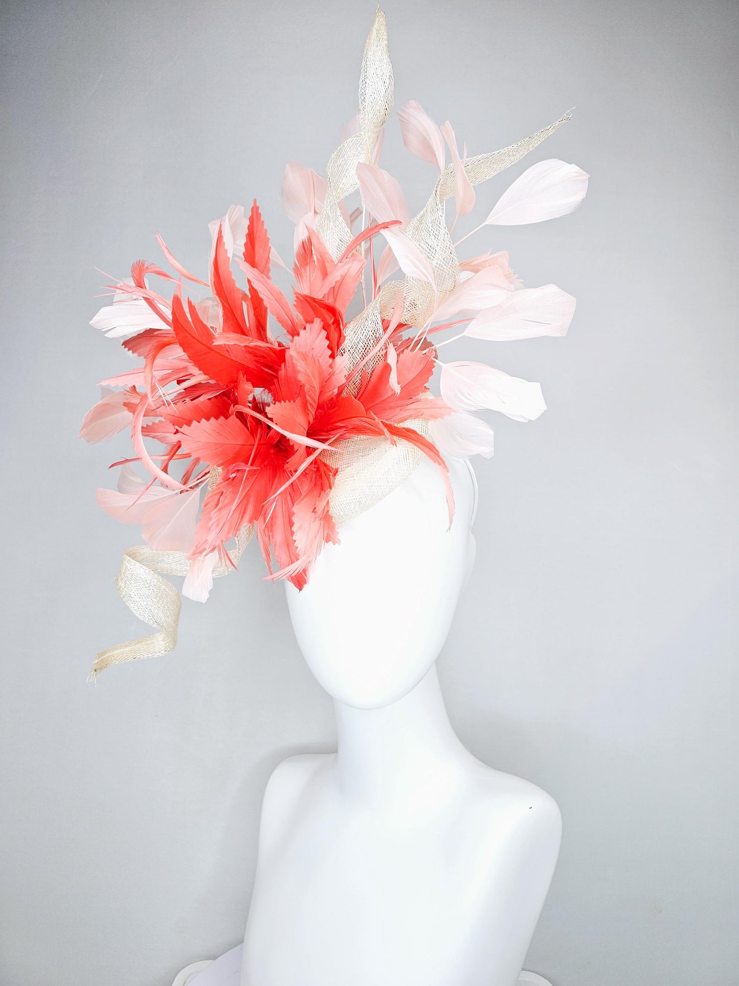 kentucky derby hat fascinator ivory white sinamay with curls,and coral feather flower with light pink branching feathers