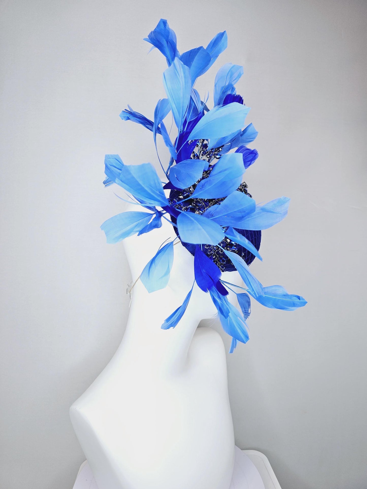 kentucky derby hat fascinator royal blue satin with netting and royal blue crystal beaded jewels stems, royal cobalt blue branching feathers