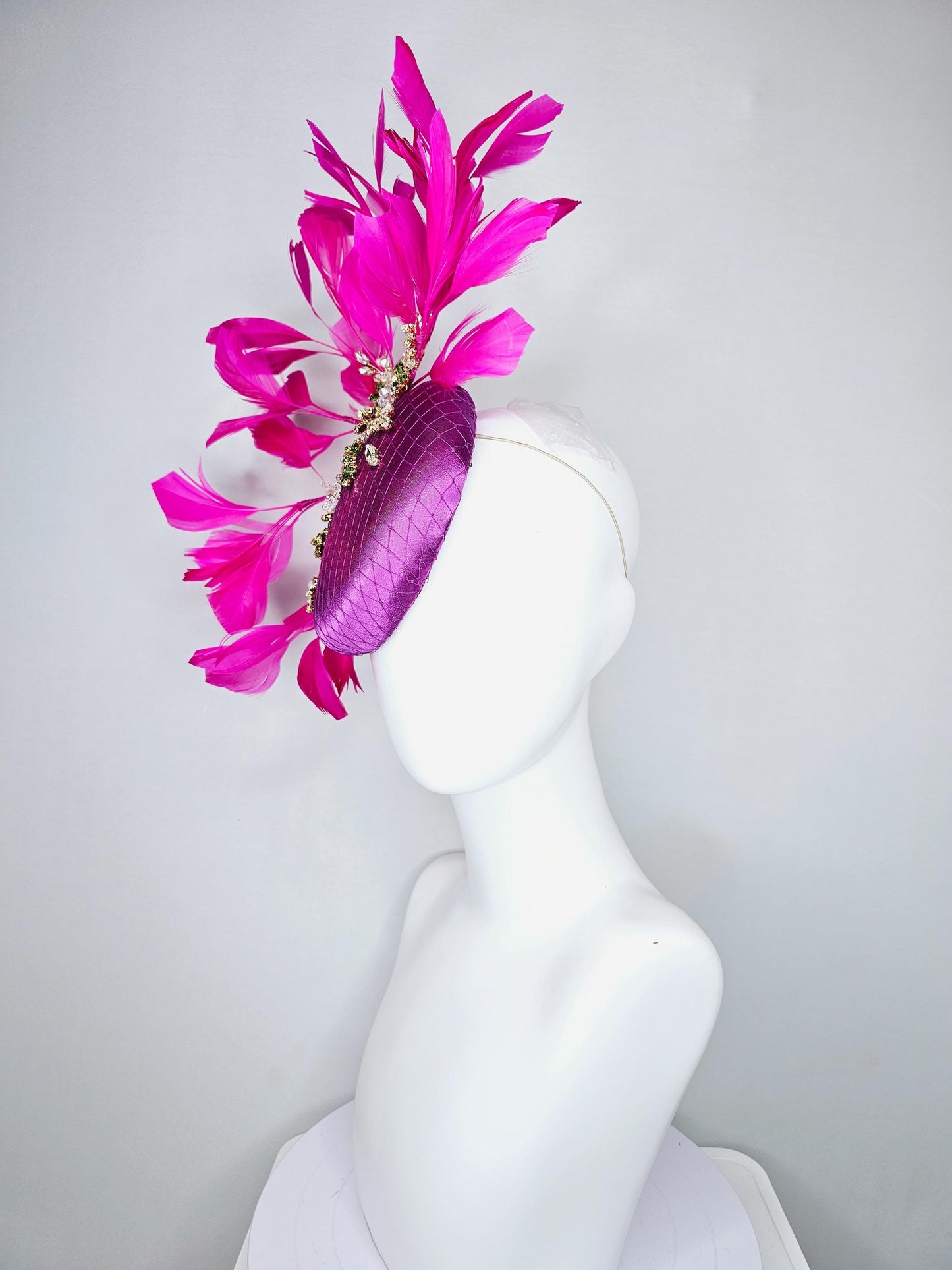 kentucky derby hat fascinator purple satin with netting,green and clear crystal beaded jewels stems,bright pink fuchsia branching feathers