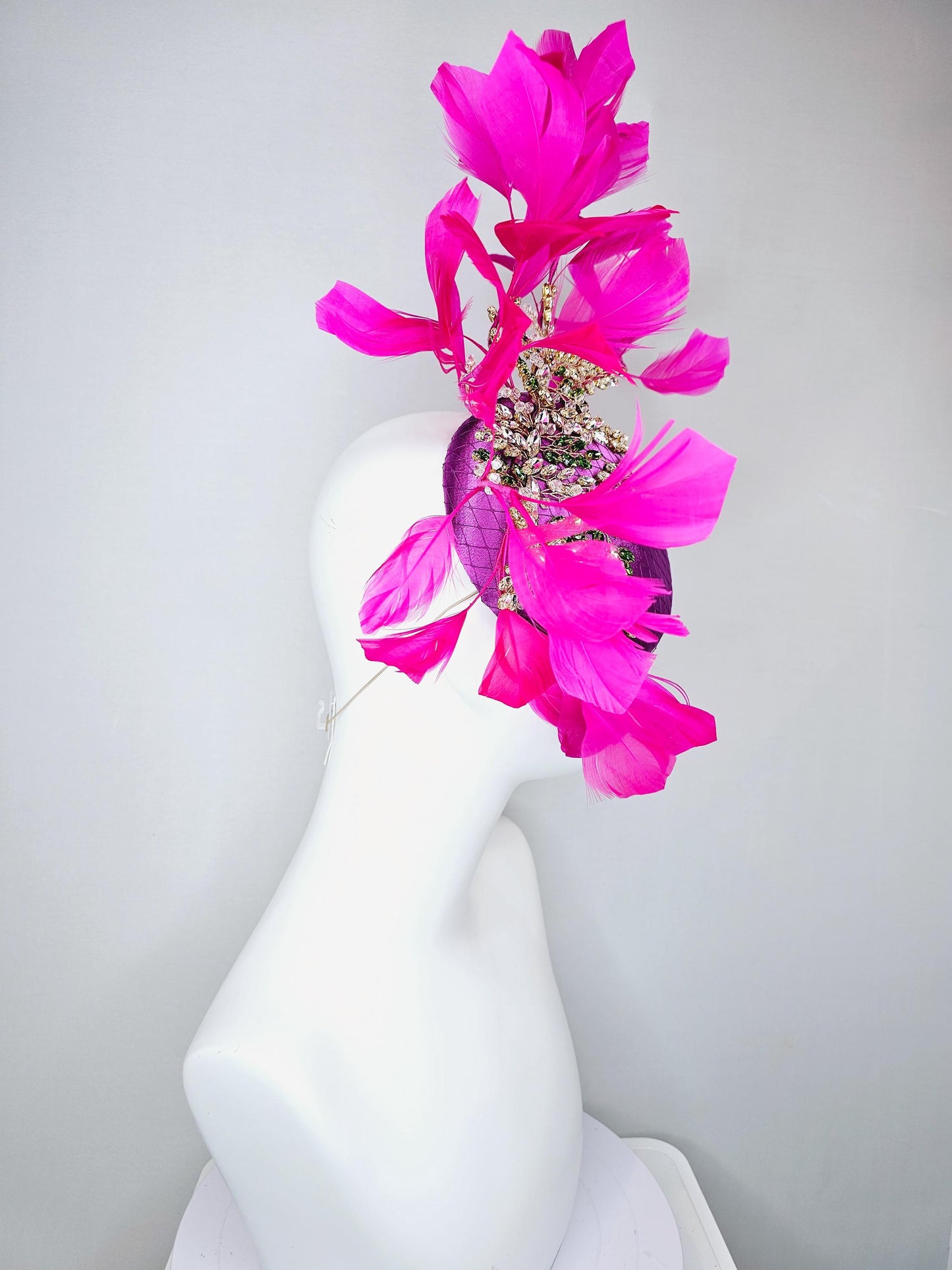 kentucky derby hat fascinator purple satin with netting,green and clear crystal beaded jewels stems,bright pink fuchsia branching feathers