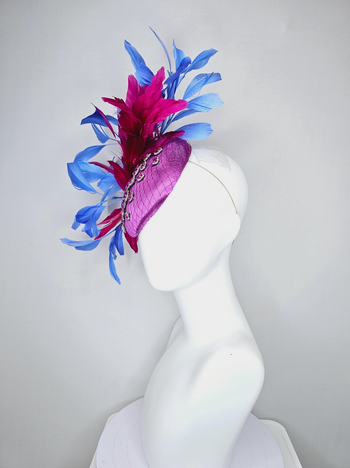 kentucky derby hat fascinator violet purple satin with netting, pink crystal rhinestones jewels, dark pink cobalt blue branching feathers