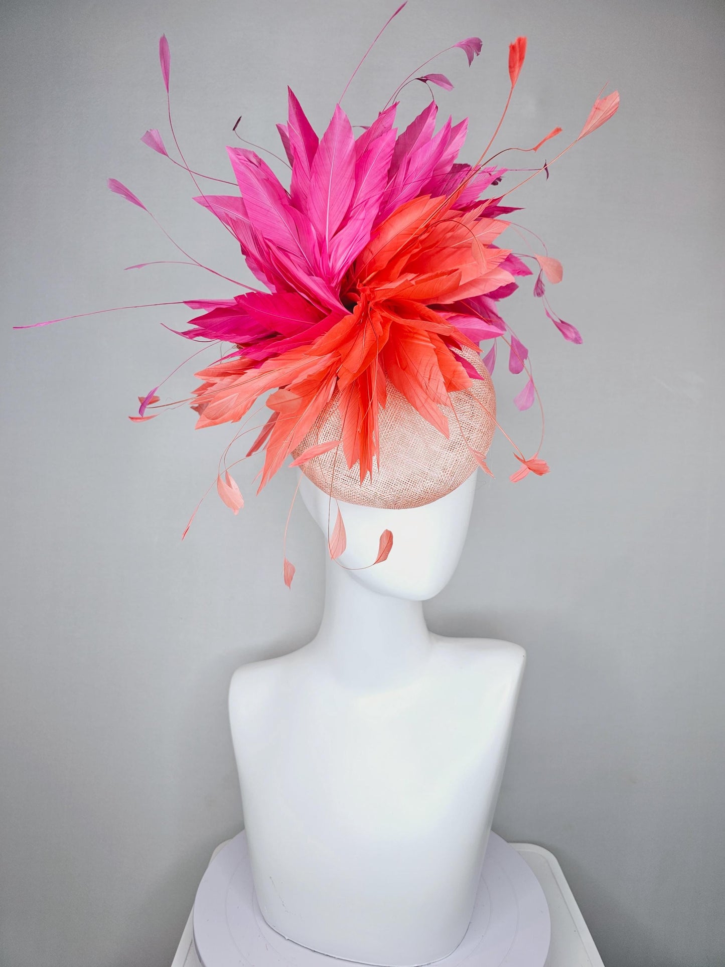 kentucky derby hat fascinator light orange peach sinamay with fluffy coral orange and hot pink branching feathers