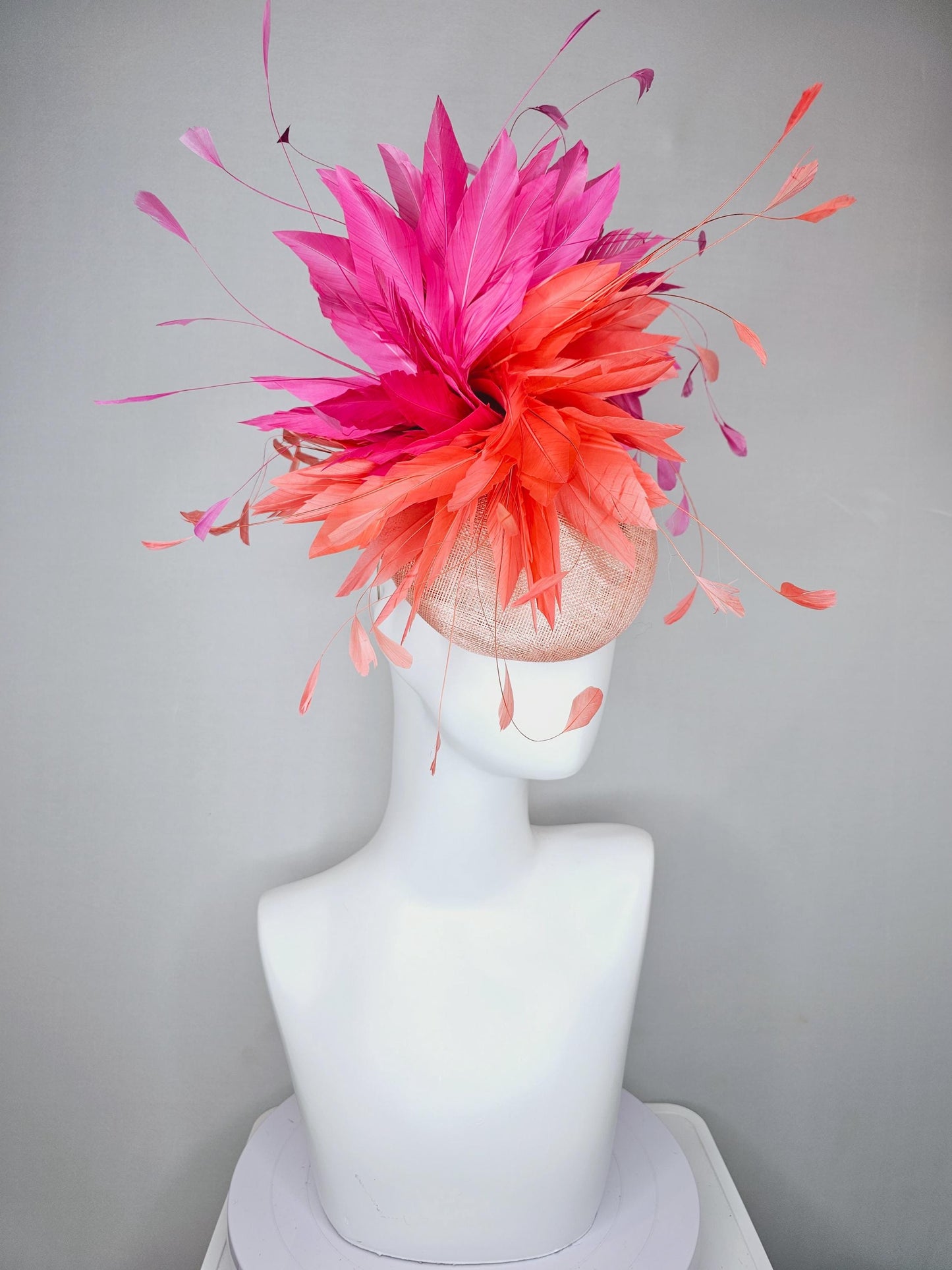 kentucky derby hat fascinator light orange peach sinamay with fluffy coral orange and hot pink branching feathers