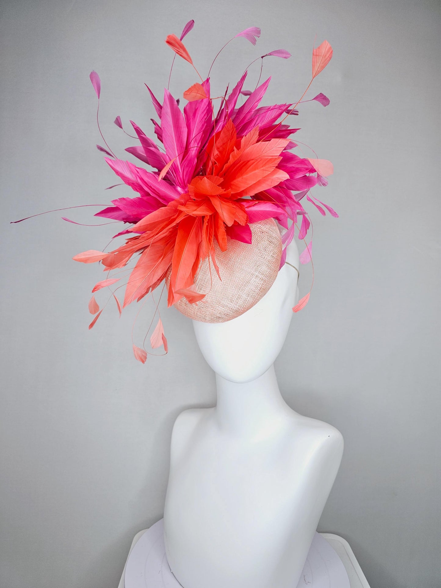 kentucky derby hat fascinator light orange peach sinamay with fluffy coral orange and hot pink branching feathers