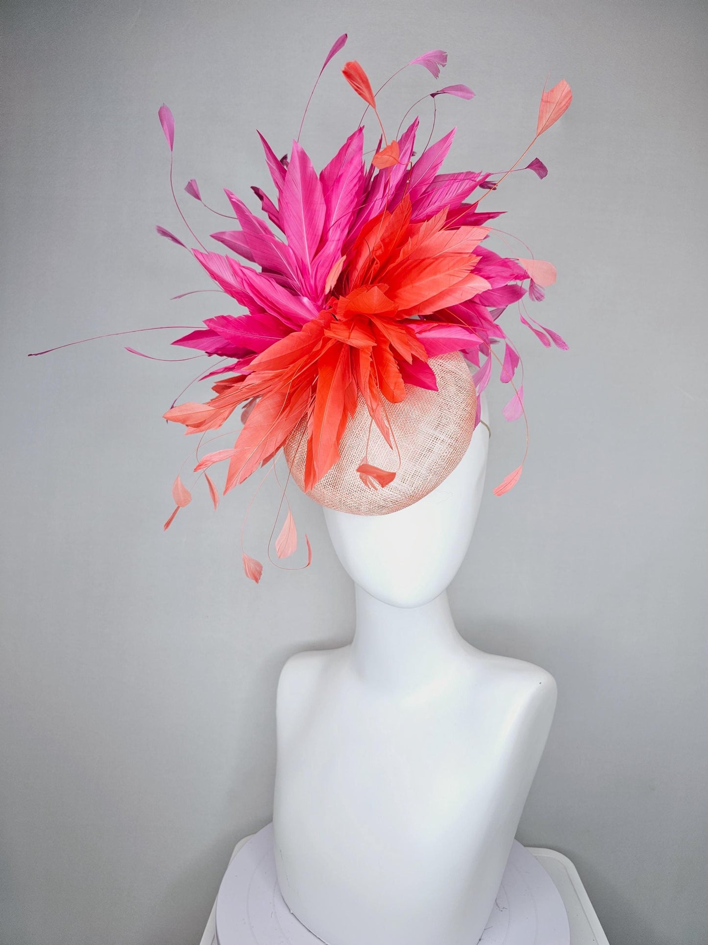 kentucky derby hat fascinator light orange peach sinamay with fluffy coral orange and hot pink branching feathers