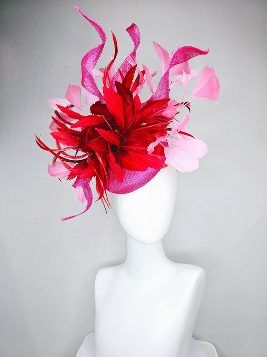 kentucky derby hat fascinator pink sinamay with large curls,bright red feathers and light pink branching feathers