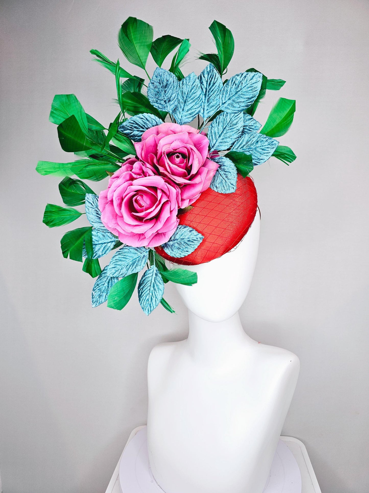 kentucky derby hat fascinator bright red satin with netting,pink satin roses,turquoise blue velvet leaves,emerald green branching feathers