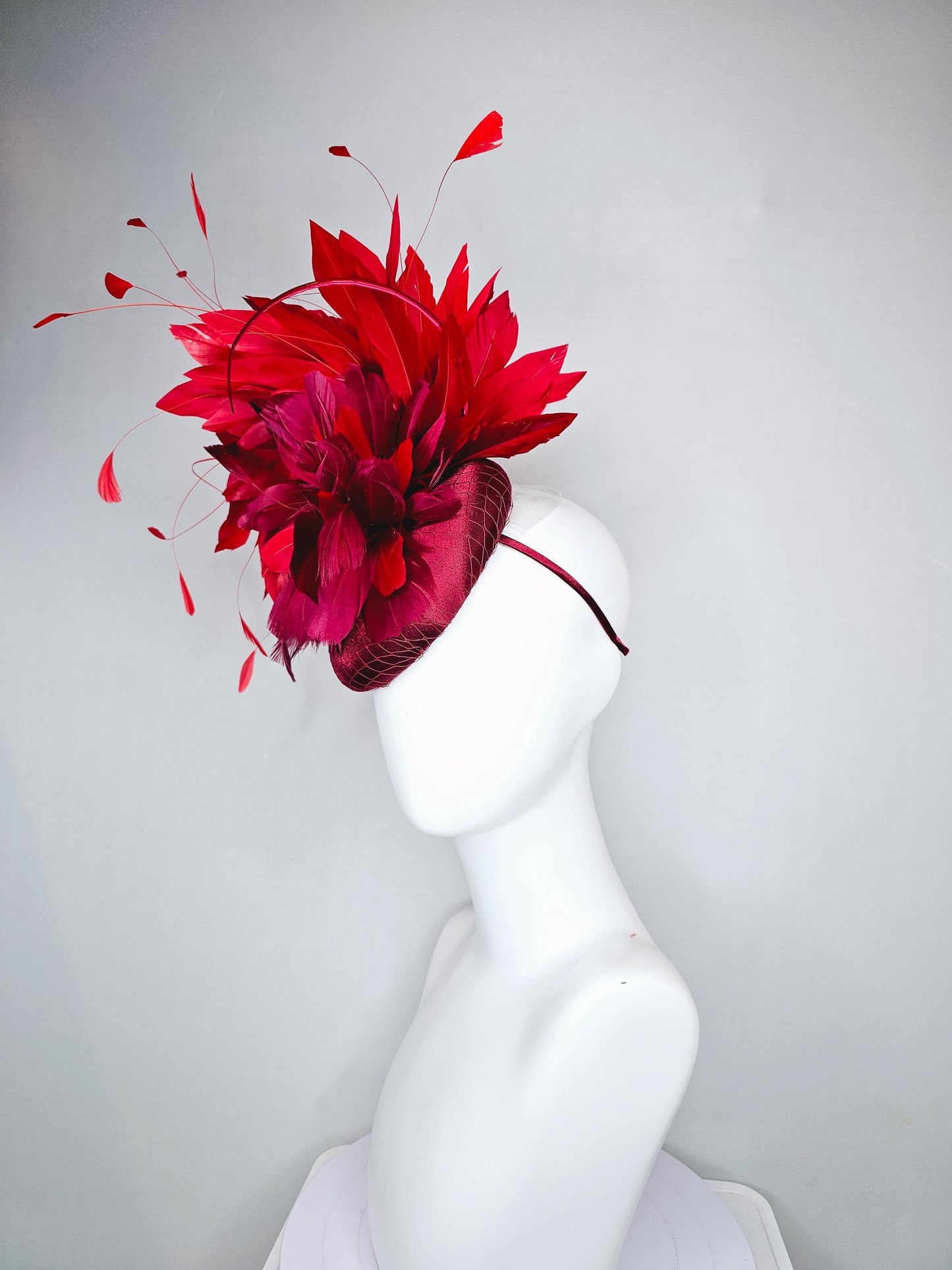 kentucky derby hat fascinator wine red burgundy satin with netting and branching bright scarlet red feathers and burgundy branching feathers