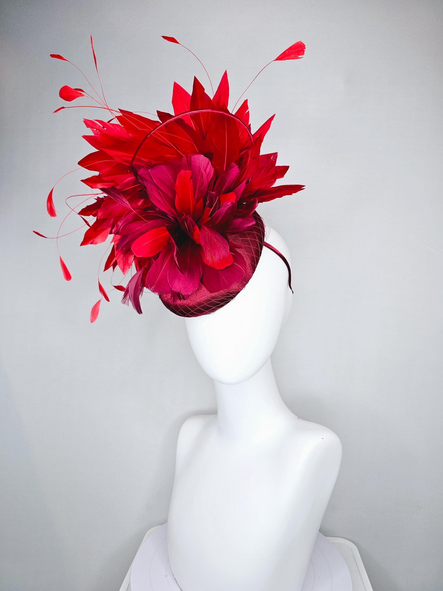 kentucky derby hat fascinator wine red burgundy satin with netting and branching bright scarlet red feathers and burgundy branching feathers