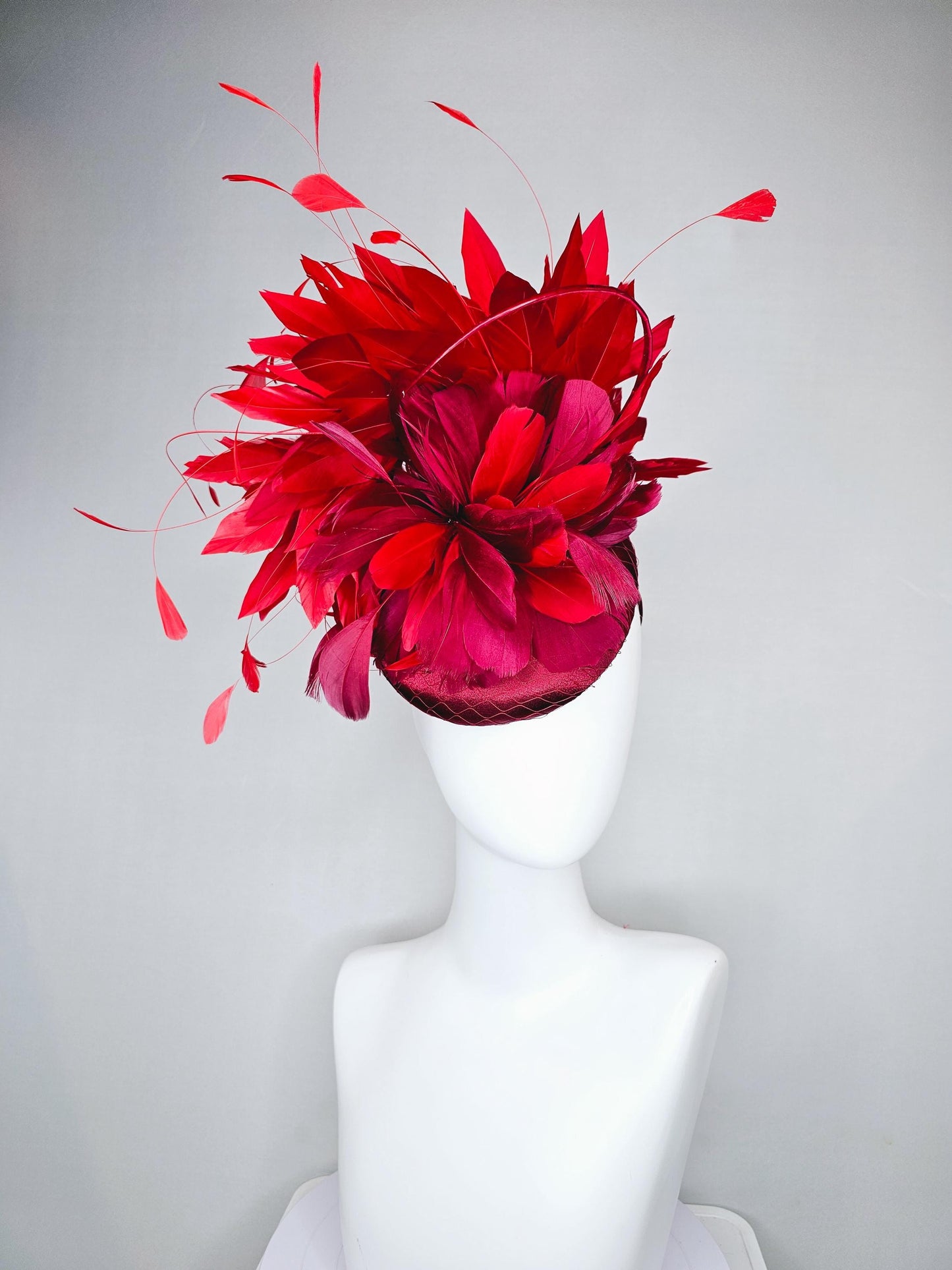 kentucky derby hat fascinator wine red burgundy satin with netting and branching bright scarlet red feathers and burgundy branching feathers