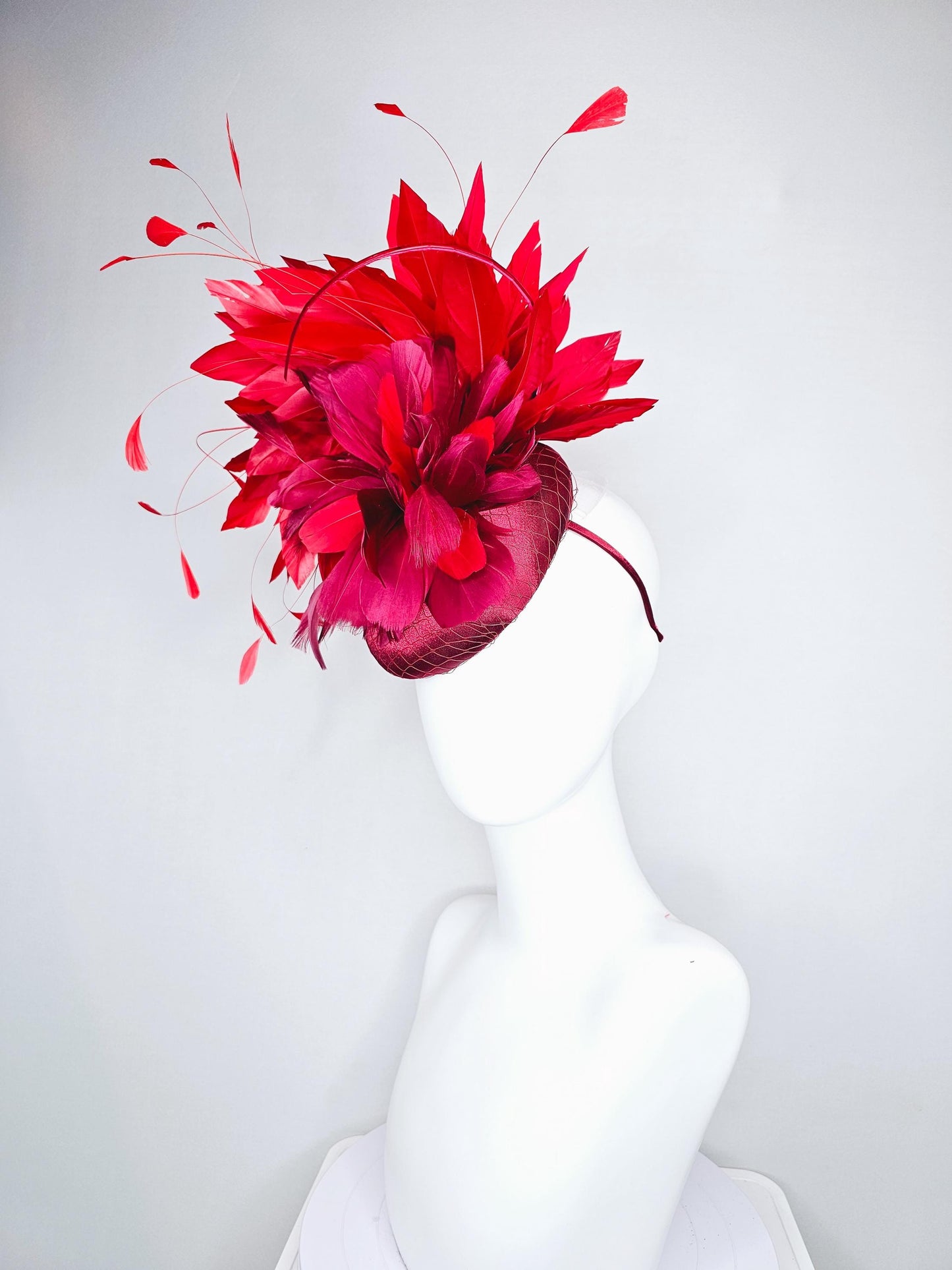 kentucky derby hat fascinator wine red burgundy satin with netting and branching bright scarlet red feathers and burgundy branching feathers