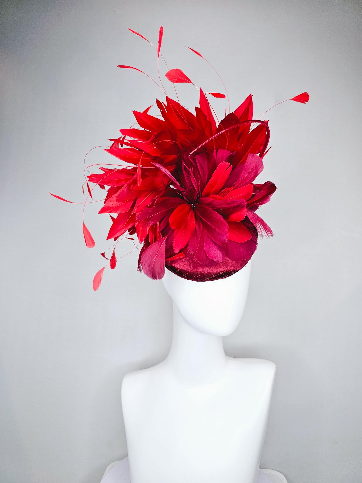 kentucky derby hat fascinator wine red burgundy satin with netting and branching bright scarlet red feathers and burgundy branching feathers