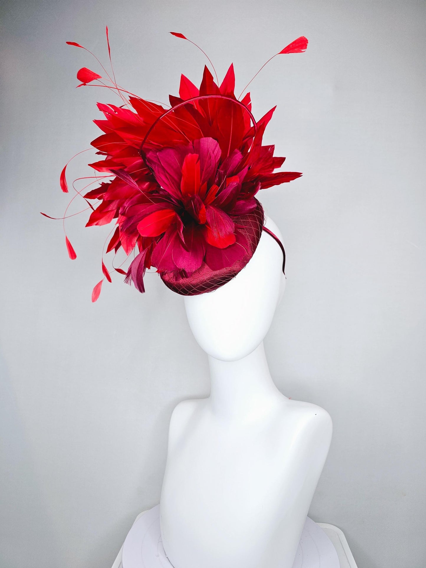 kentucky derby hat fascinator wine red burgundy satin with netting and branching bright scarlet red feathers and burgundy branching feathers