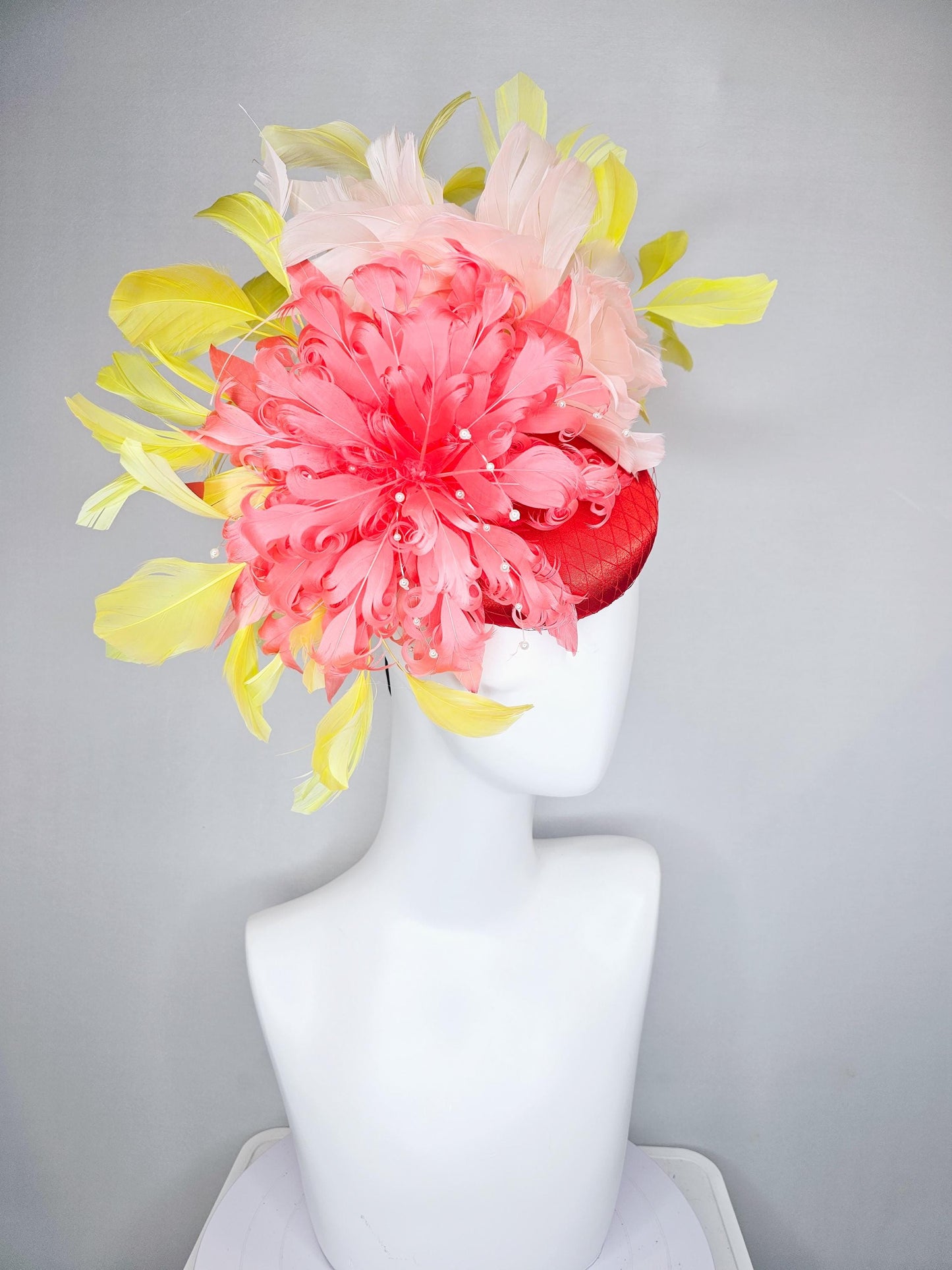 kentucky derby hat fascinator bright red satin with netting,large coral curly feather flower w/ pearl strings,yellow and light pink feathers