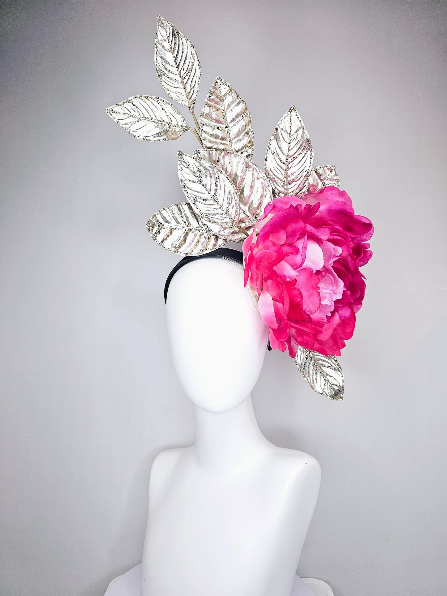 kentucky derby hat fascinator large ombre pink satin silk flower with gold sparkle glitter branching leaves on a black satin headband