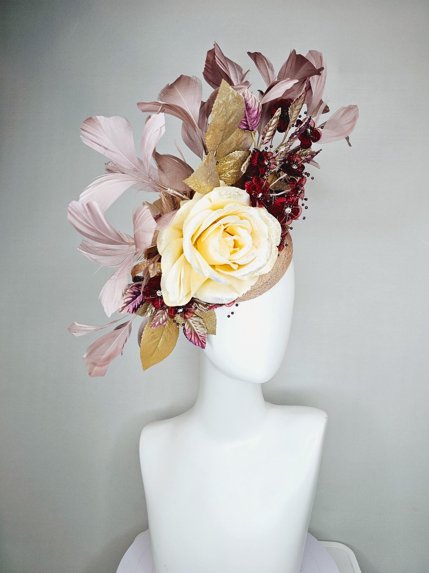 kentucky derby hat fascinator neutral cream satin rose, burgundy red flowers,gold purple ombre leaves,mauve taupe neutral tan beige feathers