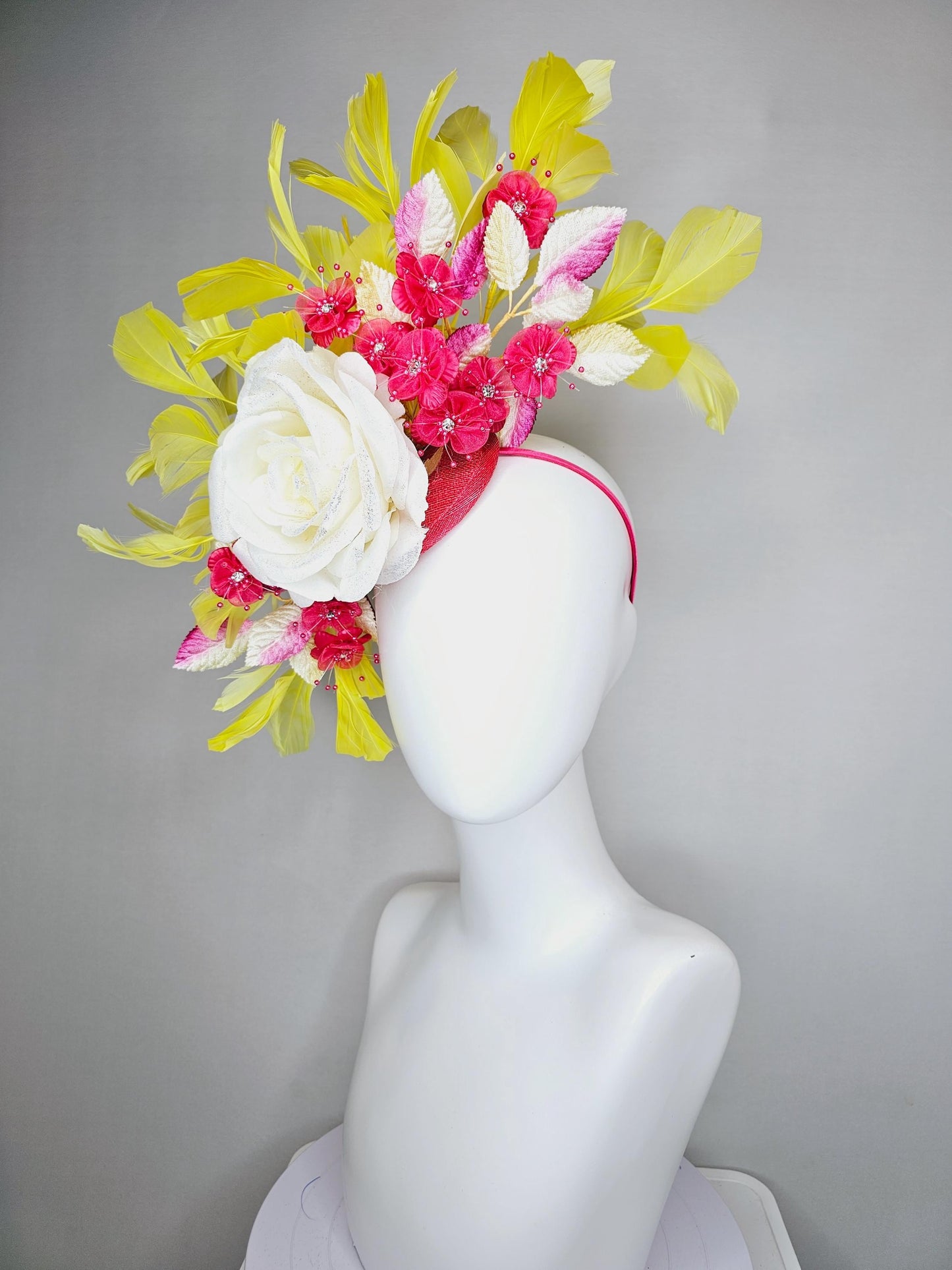 kentucky derby hat fascinator ivory white satin rose,hot pink satin flowers with pearls, yellow pink ombre leaves, yellow branching feathers