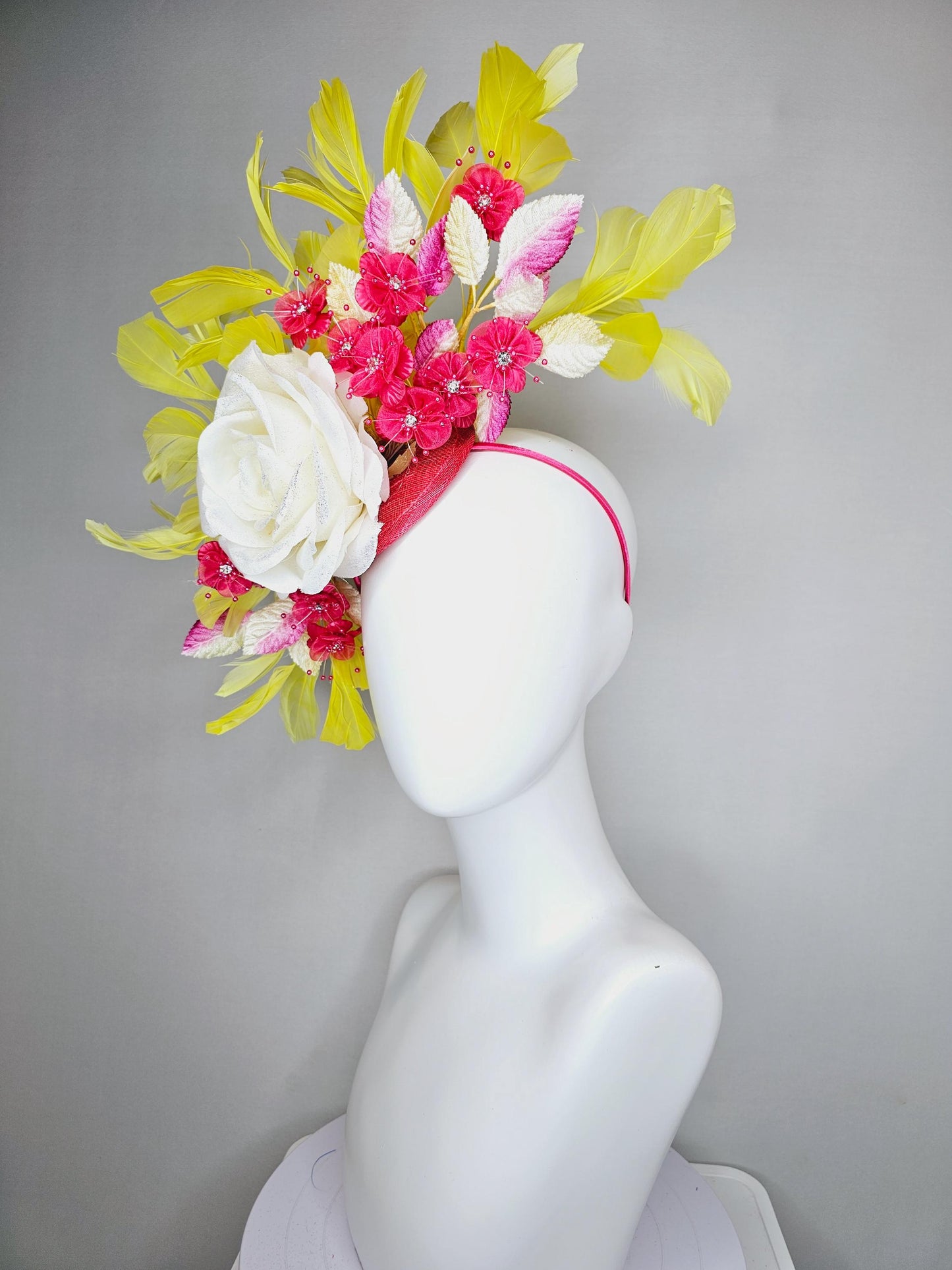 kentucky derby hat fascinator ivory white satin rose,hot pink satin flowers with pearls, yellow pink ombre leaves, yellow branching feathers