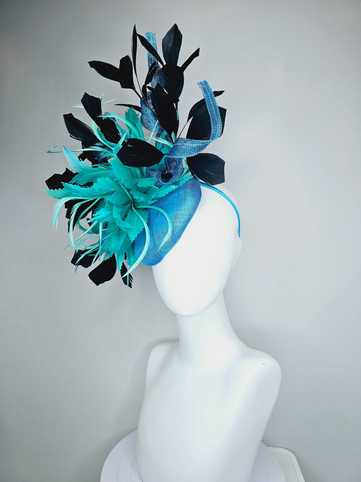 kentucky derby hat fascinator sky blue sinamay with curls, fluffy zigzag turquoise blue mint green feather flower, black branching feathers