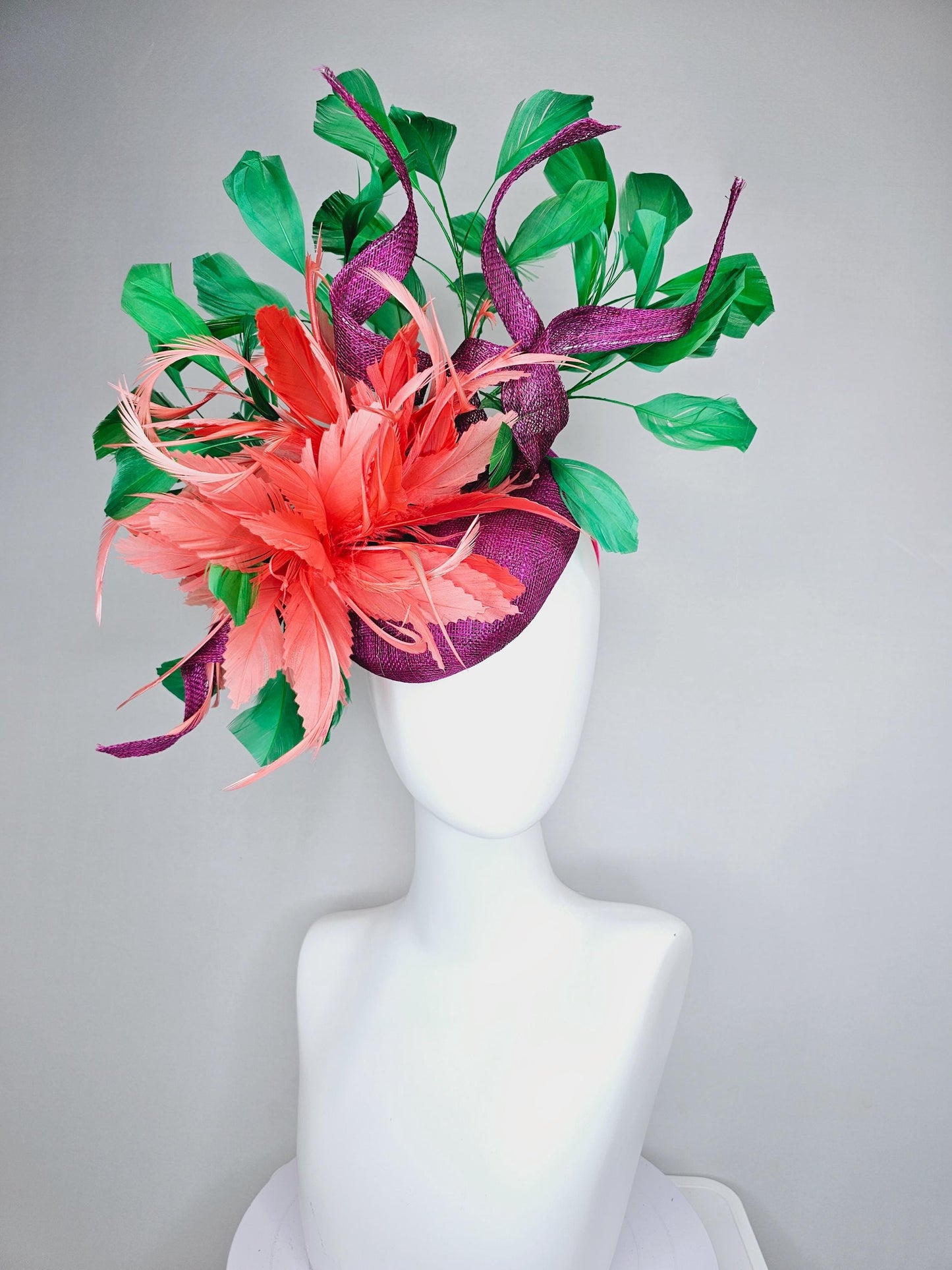 kentucky derby hat fascinator magenta purple sinamay with curls, fluffy zigzag coral orange feather flower, emerald green branching feathers