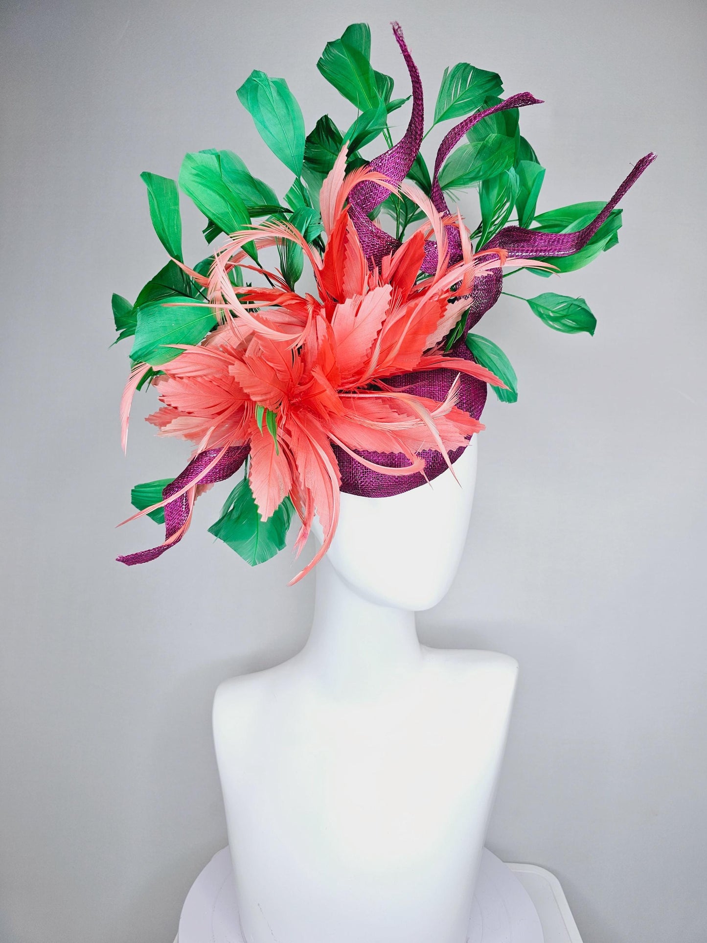 kentucky derby hat fascinator magenta purple sinamay with curls, fluffy zigzag coral orange feather flower, emerald green branching feathers