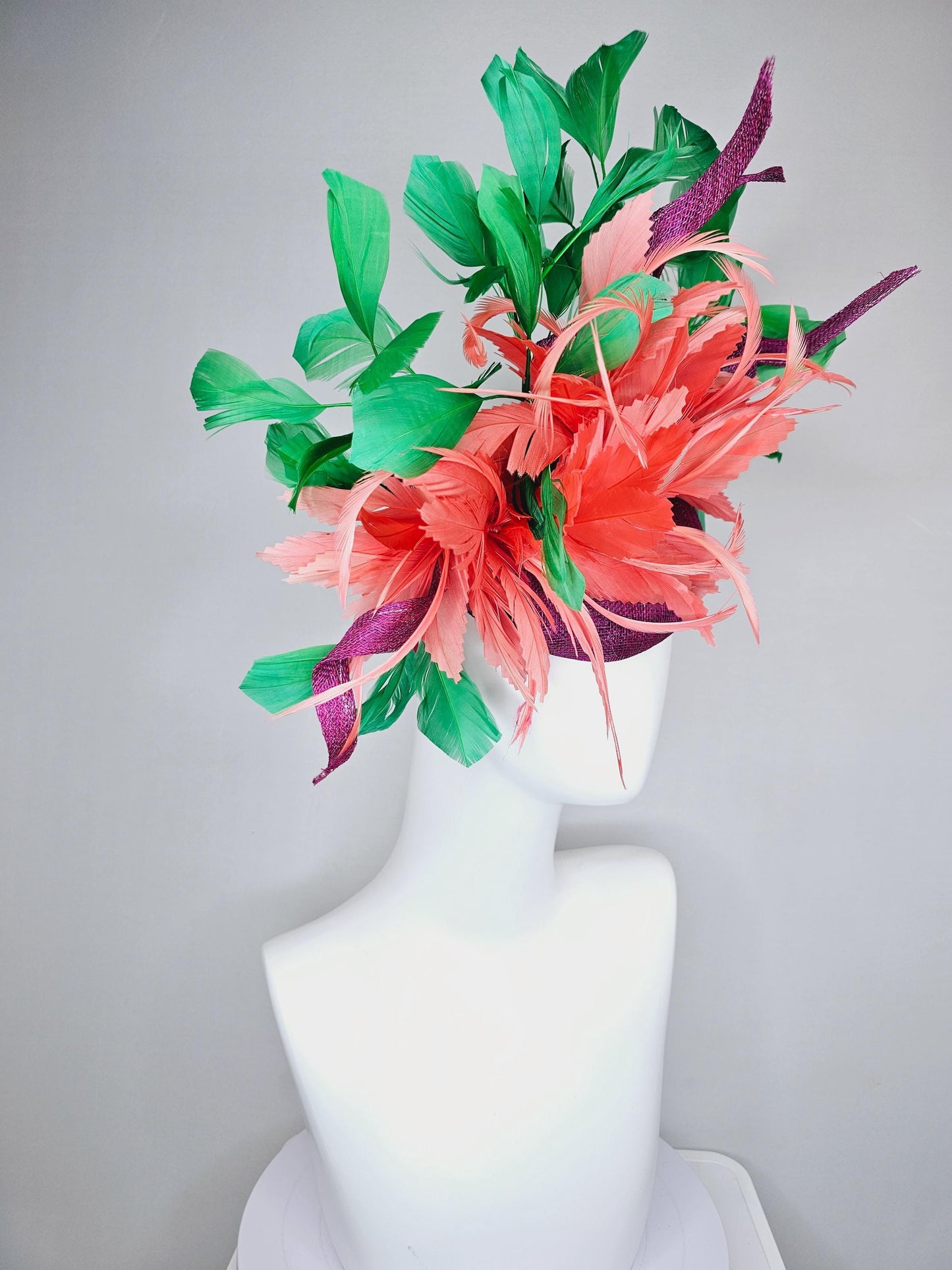 kentucky derby hat fascinator magenta purple sinamay with curls, fluffy zigzag coral orange feather flower, emerald green branching feathers