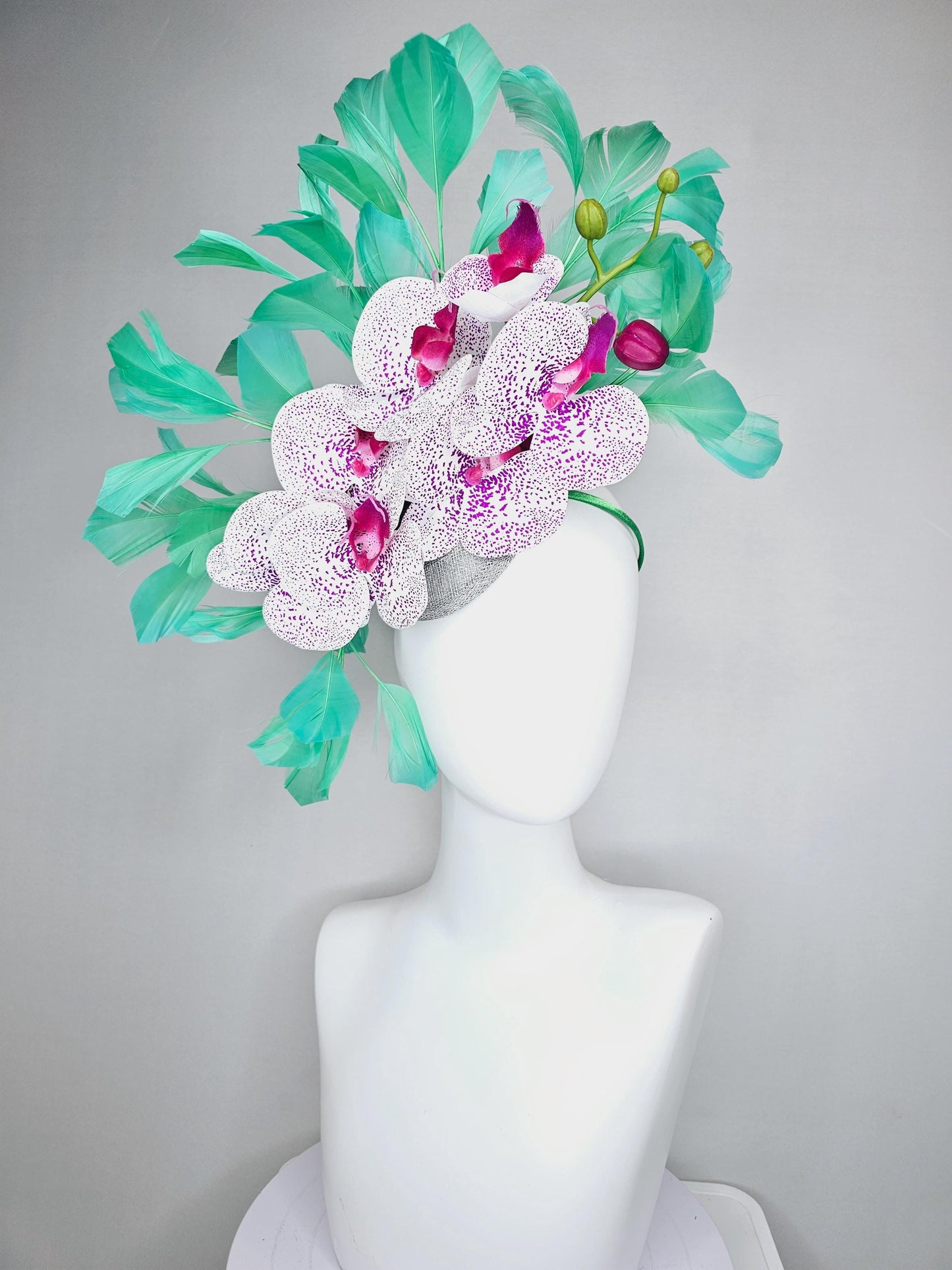 kentucky derby hat fascinator large white and purple satin silk orchid flowers, bright mint green branching feathers