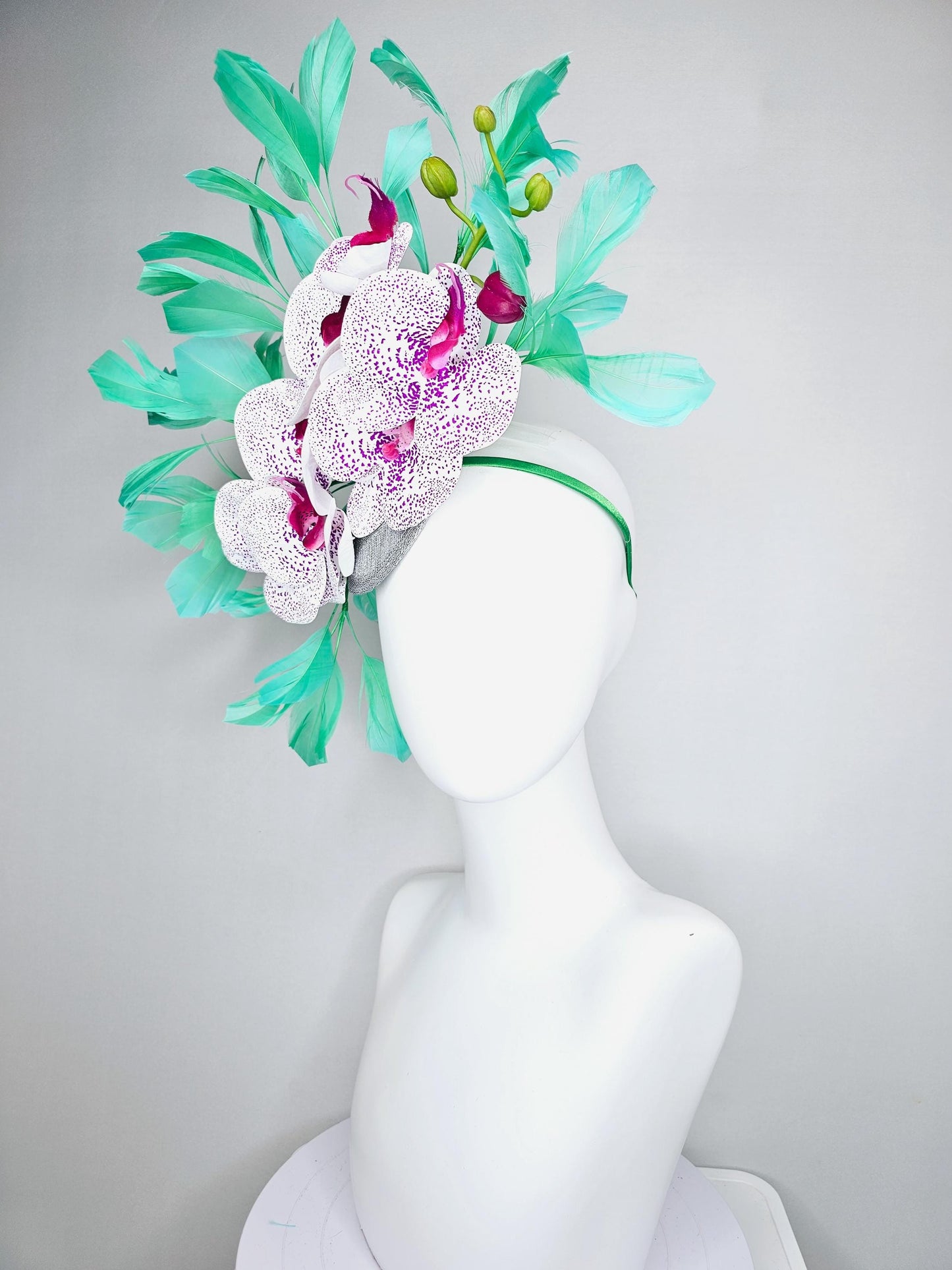 kentucky derby hat fascinator large white and purple satin silk orchid flowers, bright mint green branching feathers