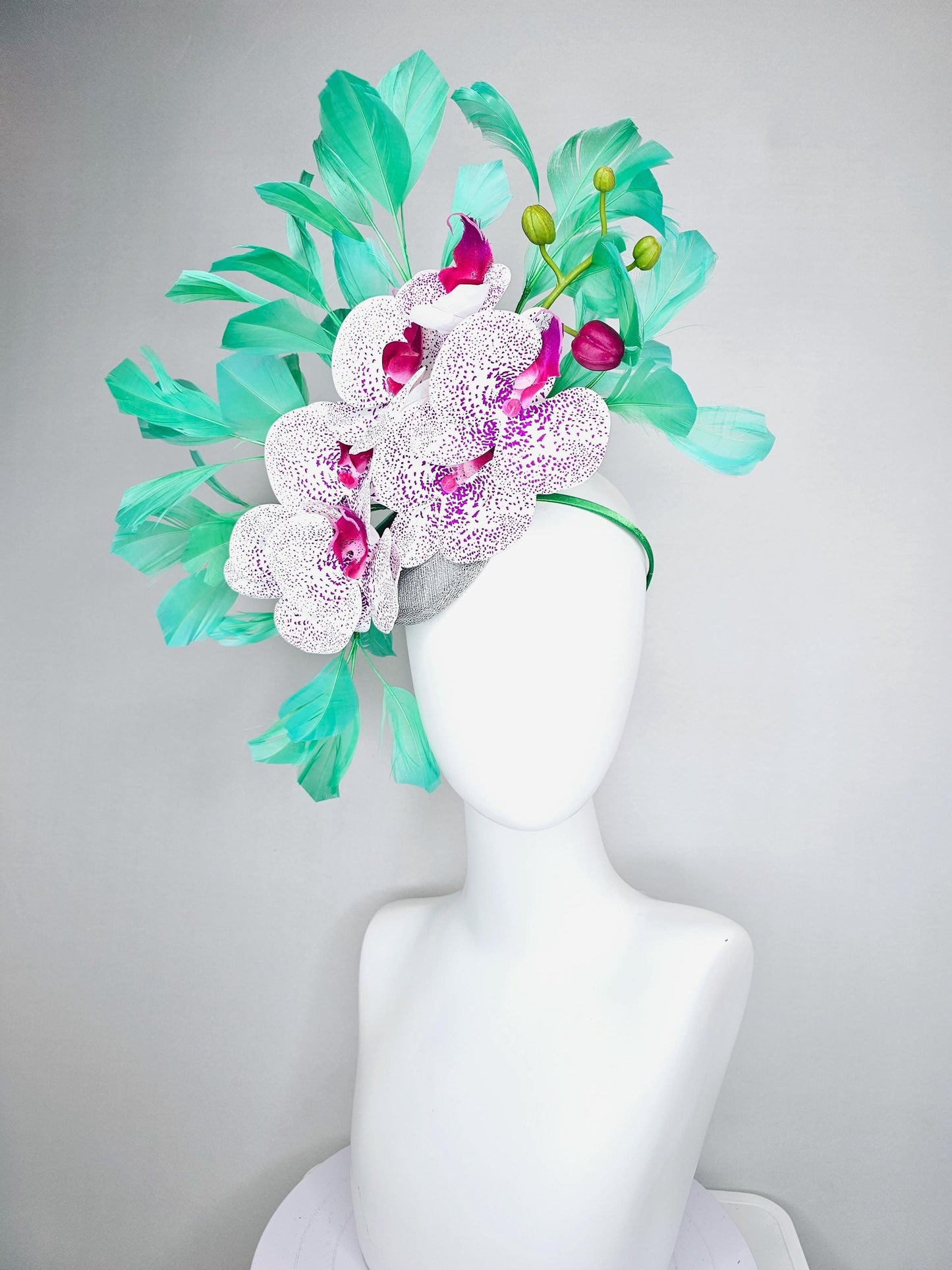 kentucky derby hat fascinator large white and purple satin silk orchid flowers, bright mint green branching feathers