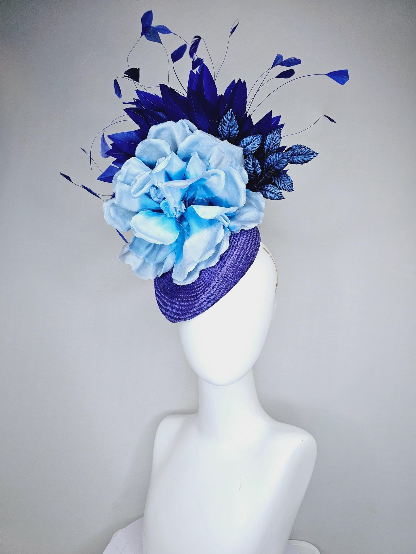 kentucky derby hat fascinator royal blue woven base with large light blue satin silk rose flower and midnight navy blue branching feathers